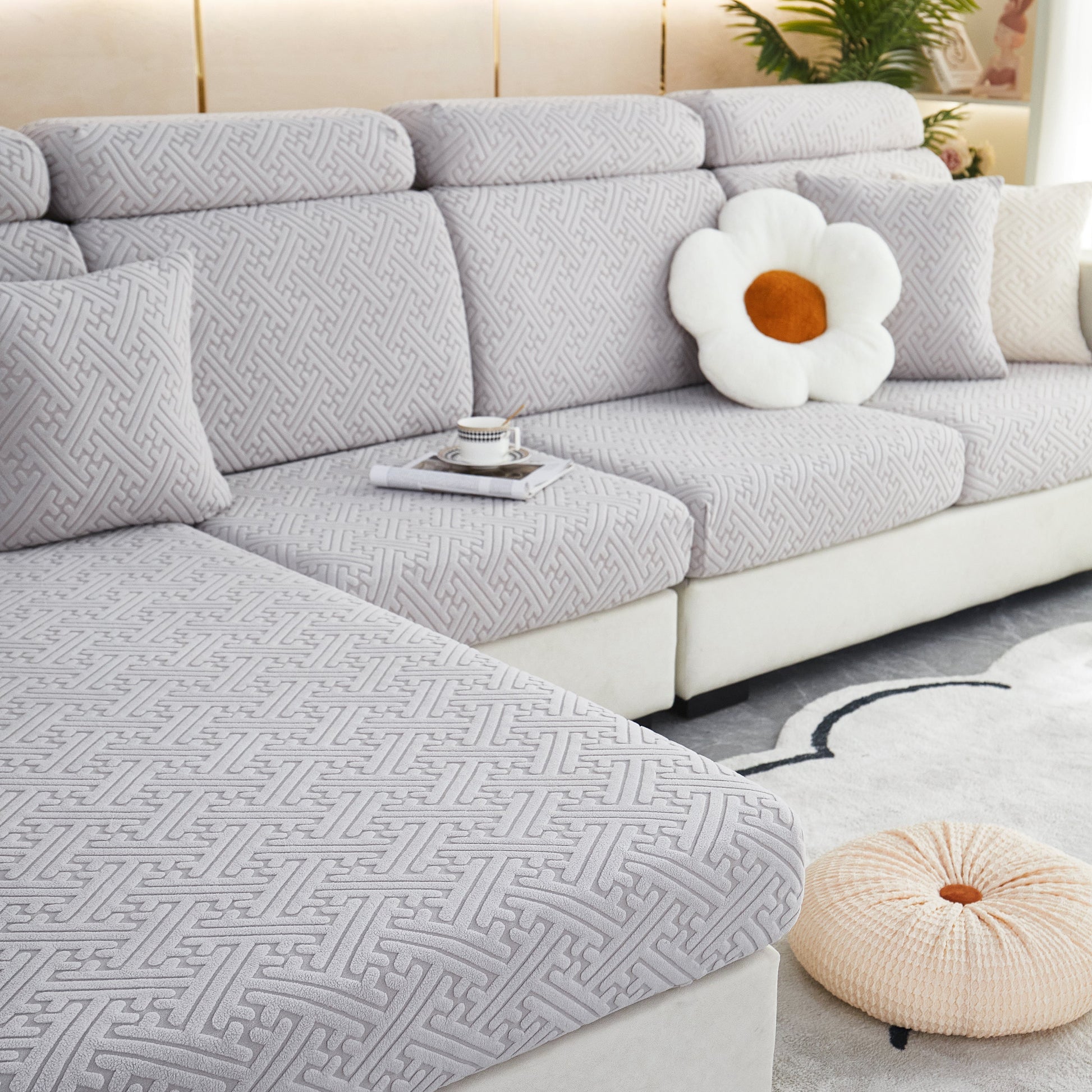 Polar Fleece Couch Cushion Covers on modern sofa with geometric pattern, elastic furniture protector for pets, kid, offering style and comfort.