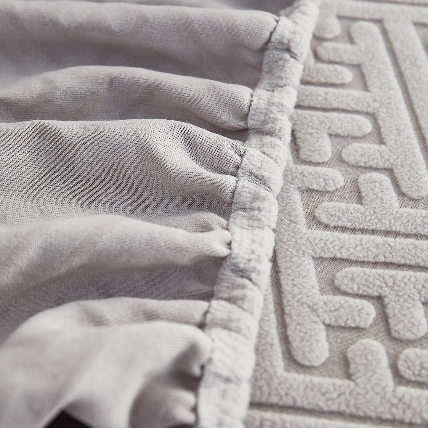 Close-up of Polar Fleece Couch Cushion Covers, Stretch Sofa Seat Cushion Covers with elastic fit, ideal for pets and kids.