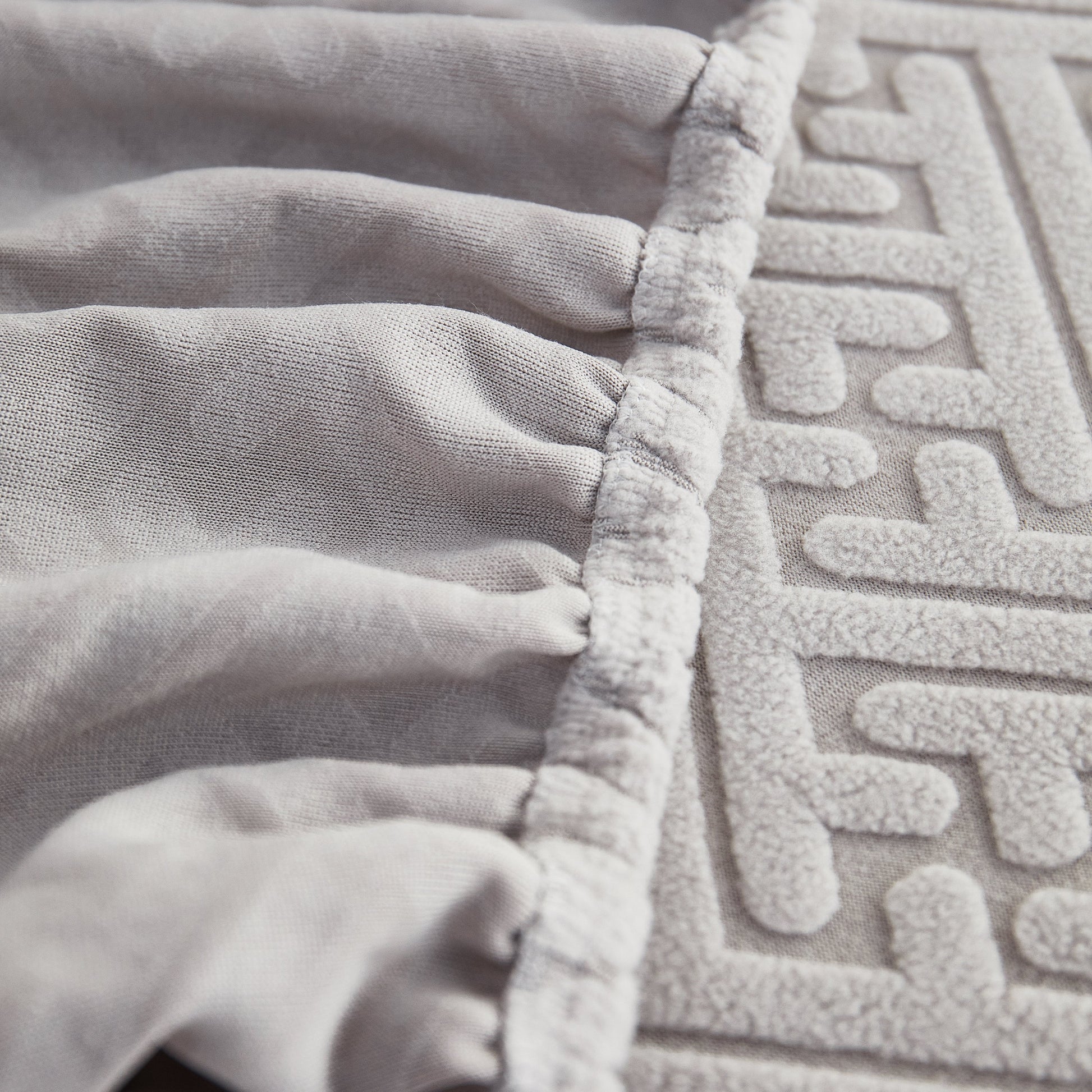 Close-up of Polar Fleece Couch Cushion Covers, Stretch Sofa Seat Cushion Covers with elastic fit, ideal for pets and kids.