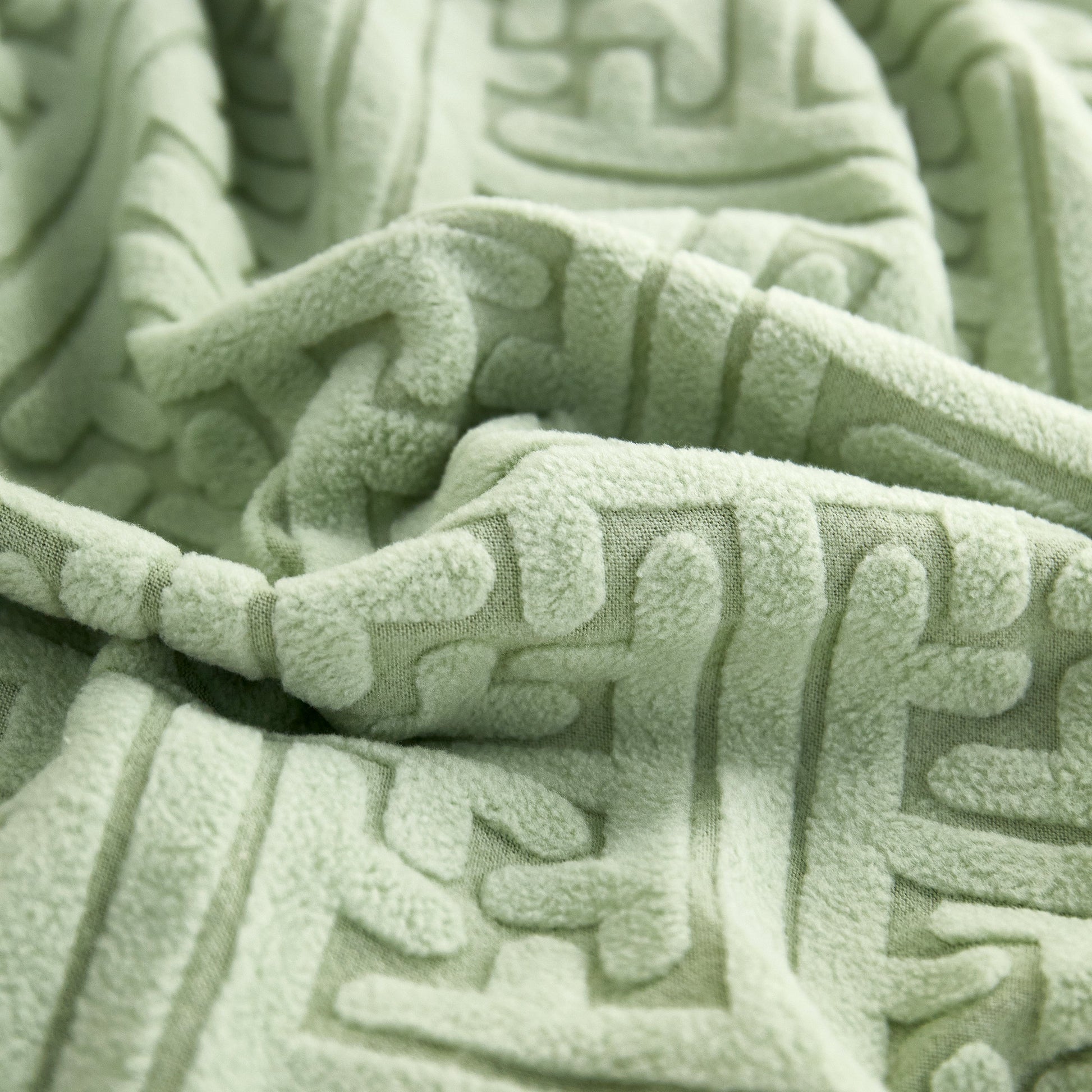 Close-up of Polar Fleece Couch Cushion Covers with a unique pattern, showcasing soft and durable fabric for furniture protection.