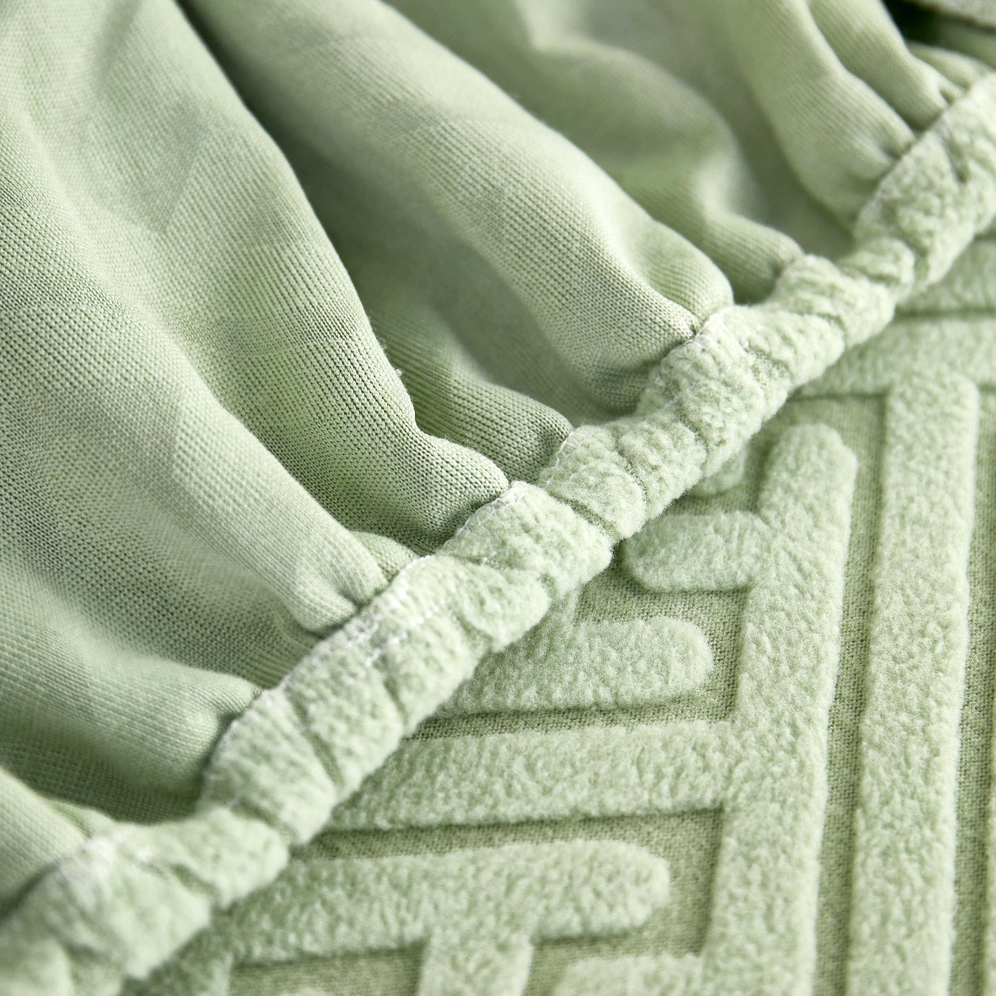 Close-up of Polar Fleece Couch Cushion Covers, Stretch Sofa Seat Cushion Covers, Elastic Furniture Protector for Pets, Kid in green color
