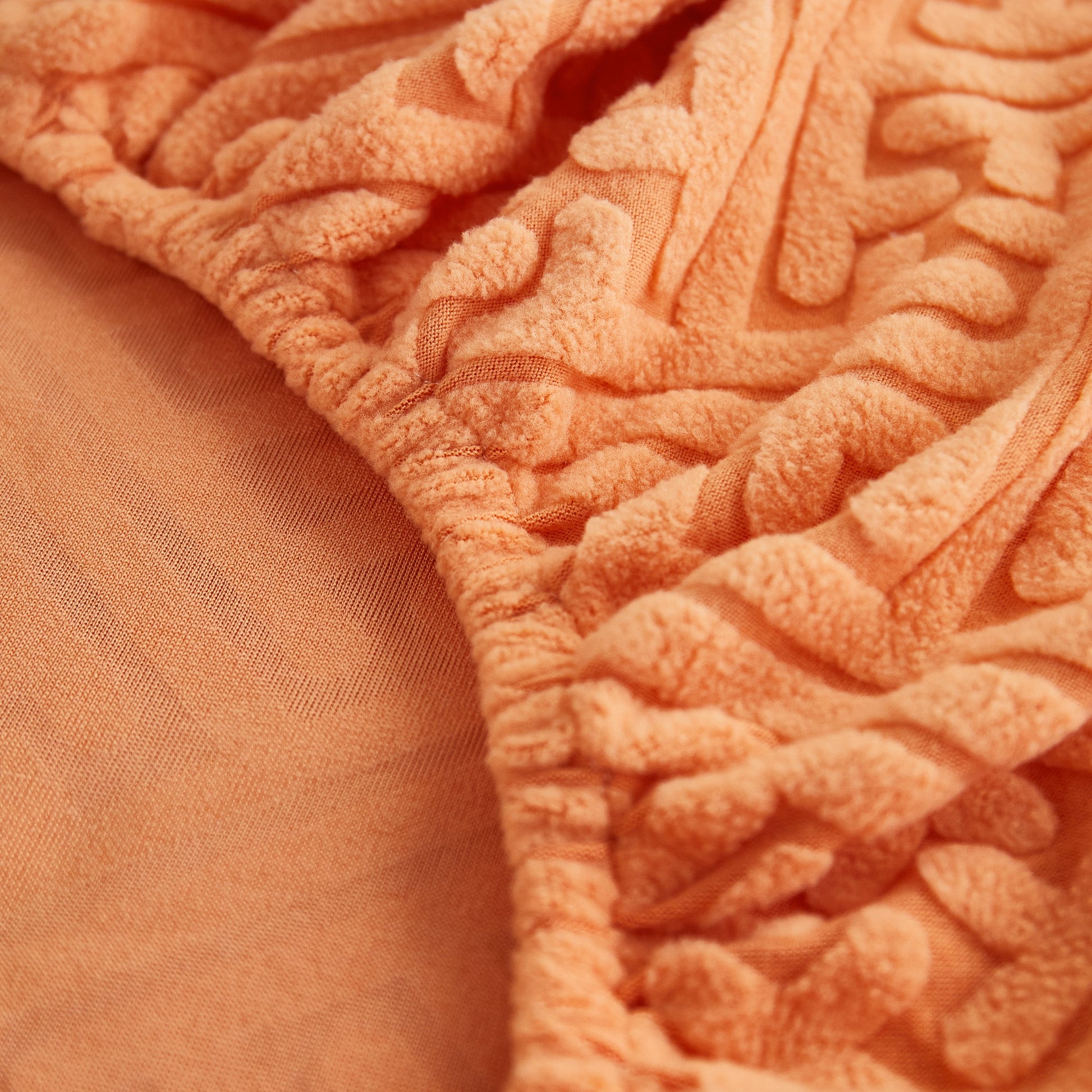 Close-up of Polar Fleece Couch Cushion Covers with elastic design, stretchy and protective for pets and kids.