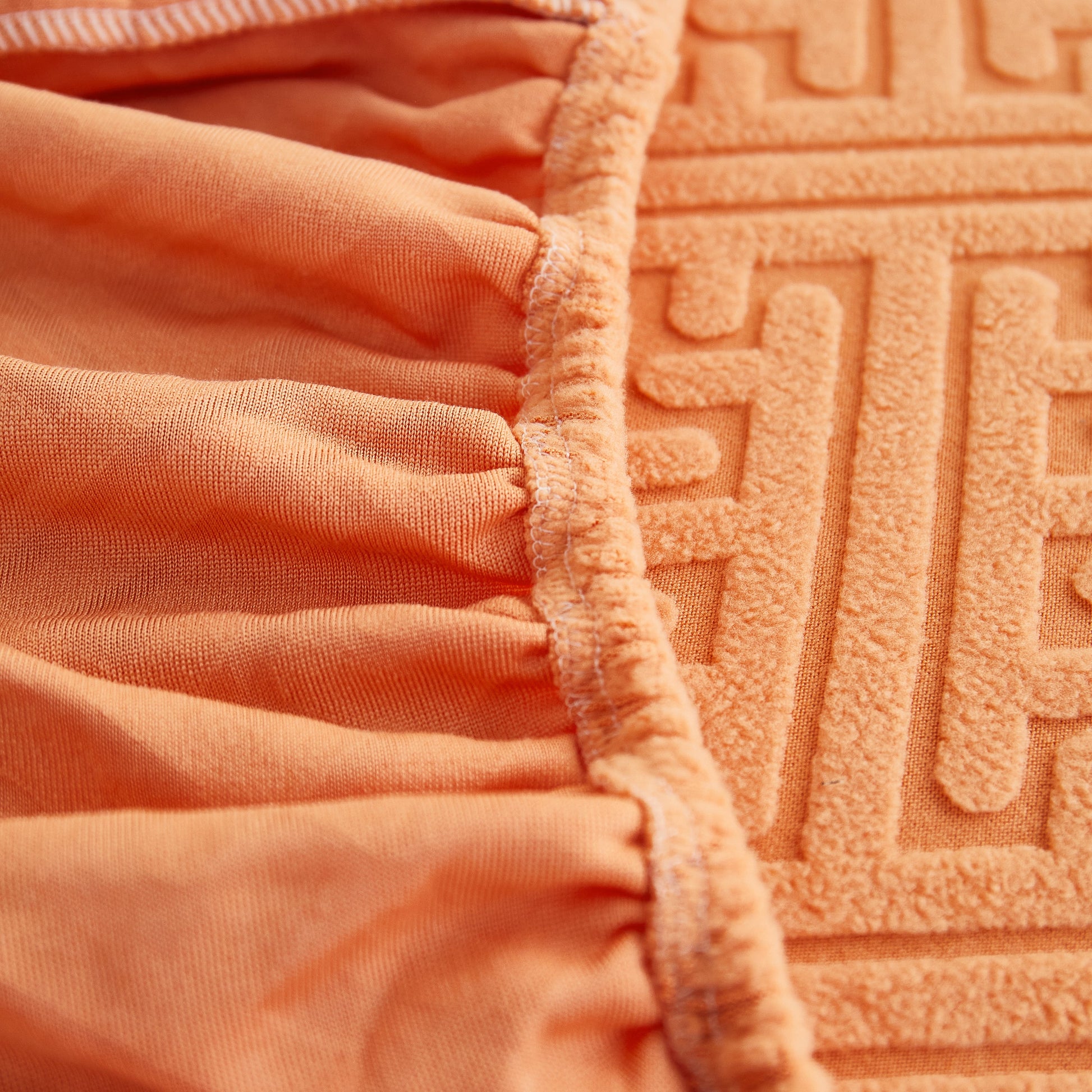 Close-up of Polar Fleece Couch Cushion Covers, Stretch Sofa Seat Cushion Covers showcasing elastic fit and detailed texture.