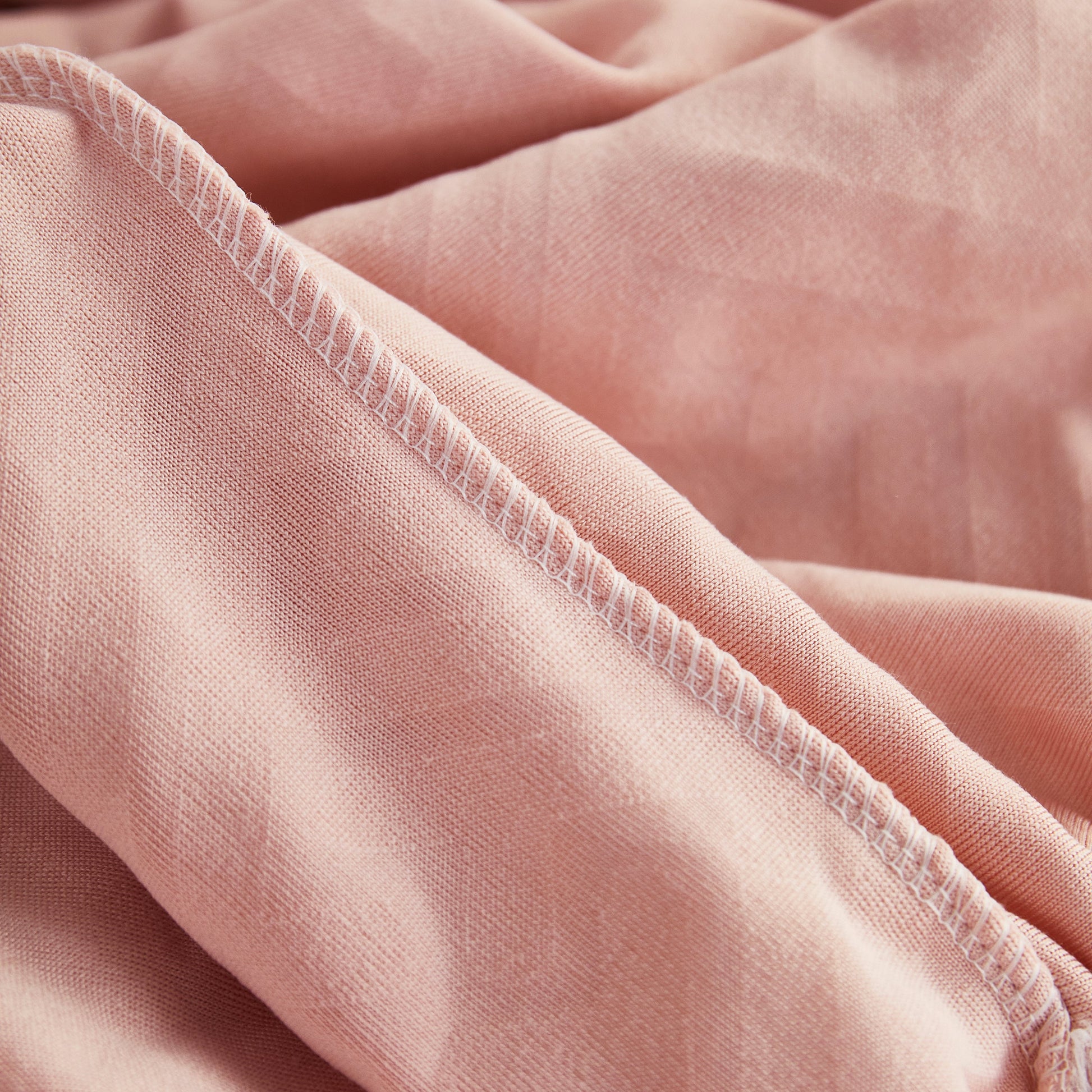 Close-up of pink fabric for Polar Fleece Couch Cushion Covers, Stretch Sofa Seat Cushion Covers, Elastic Furniture Protector for Pets, Kid.