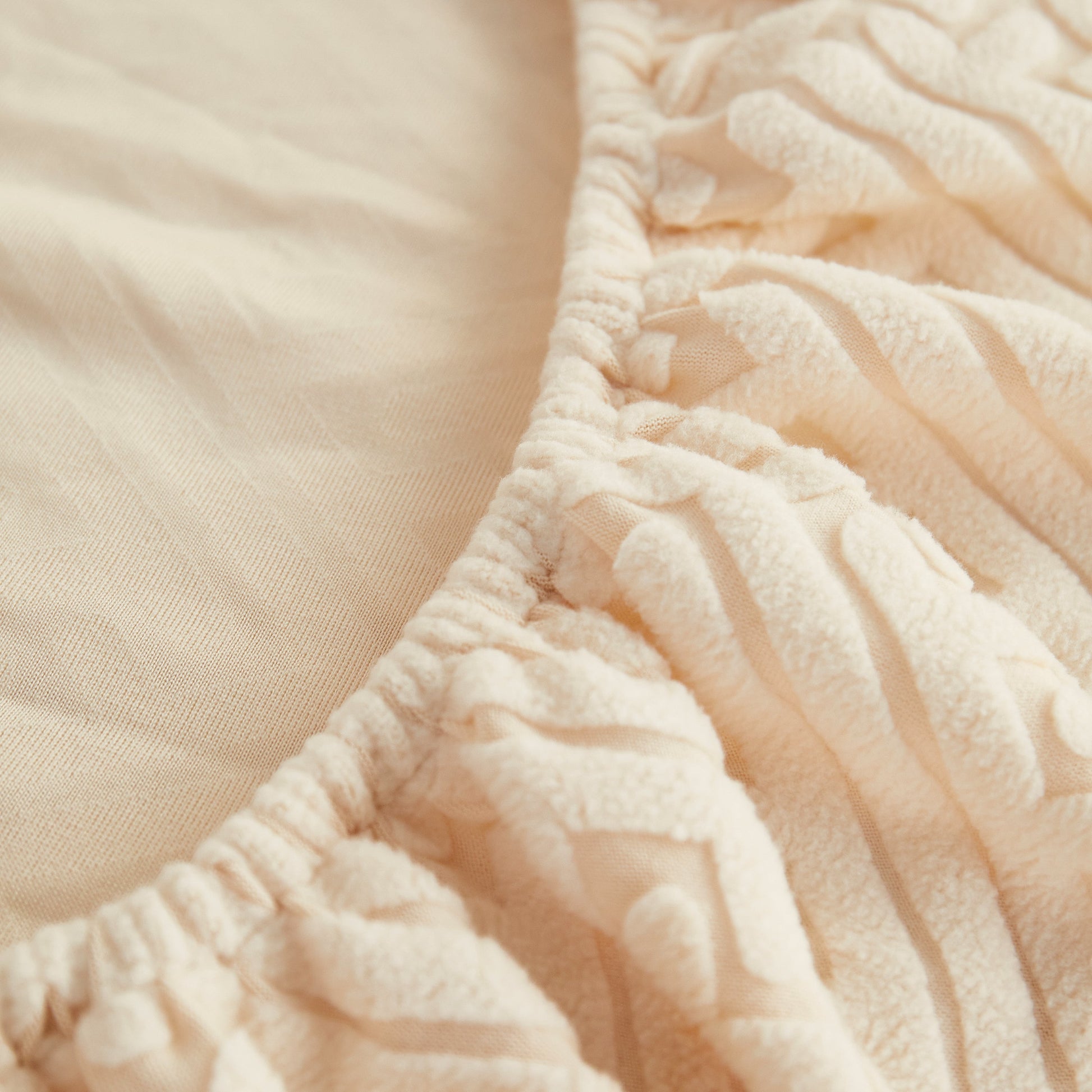 Close-up of Polar Fleece Couch Cushion Covers, Stretch Sofa Seat Cushion Covers showing elastic edge detail for snug fit.