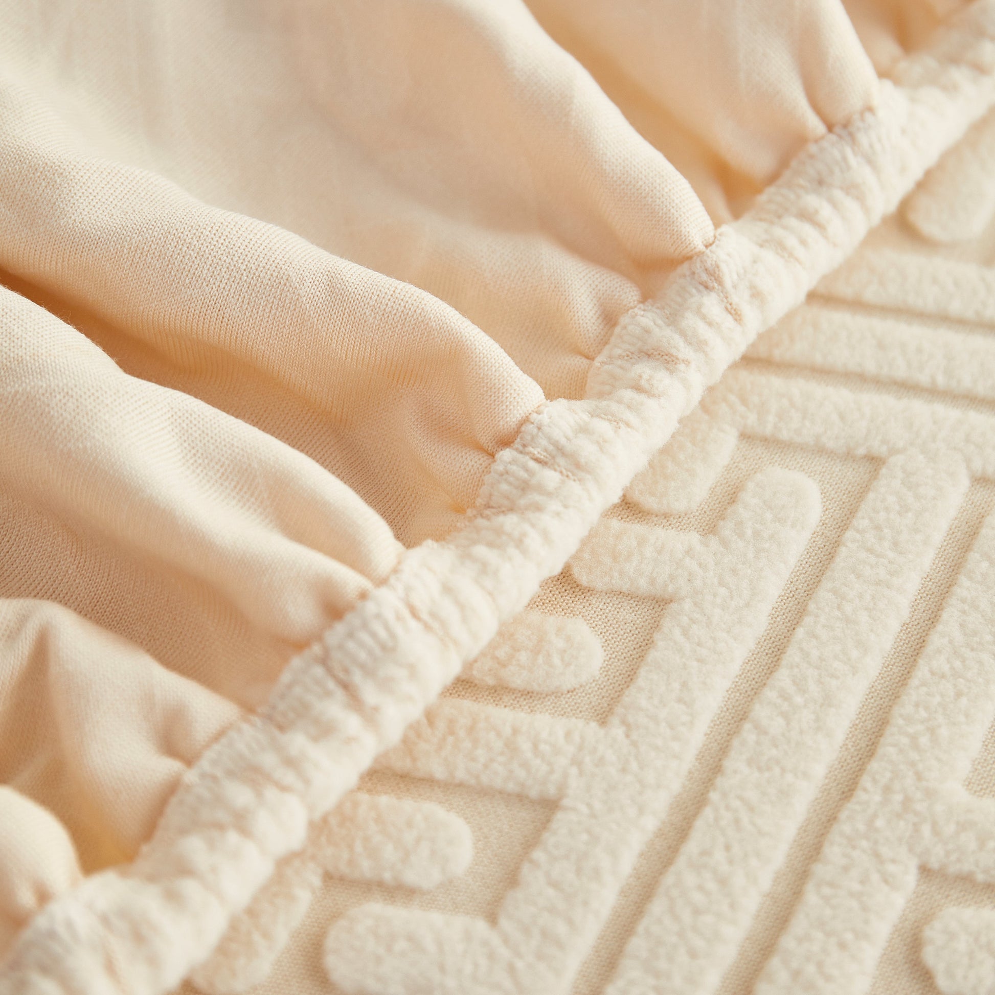 Close-up of Polar Fleece Couch Cushion Covers showing elastic design and texture.