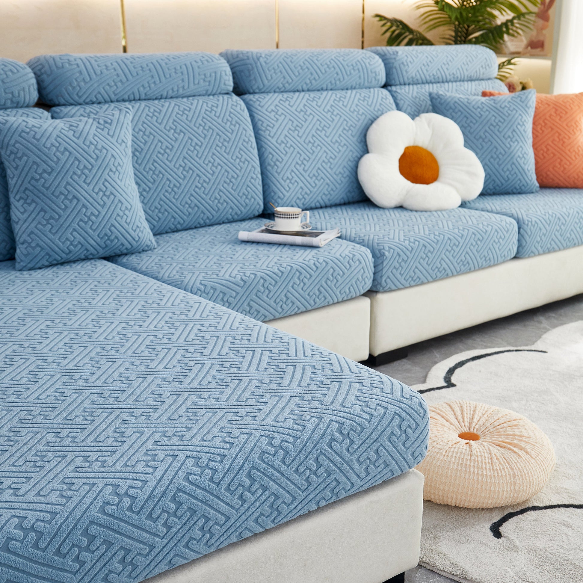 Polar Fleece Couch Cushion Covers on a blue sofa showcasing a stretch fit; Elastic Furniture Protector for Pets, Kid in stylish design.