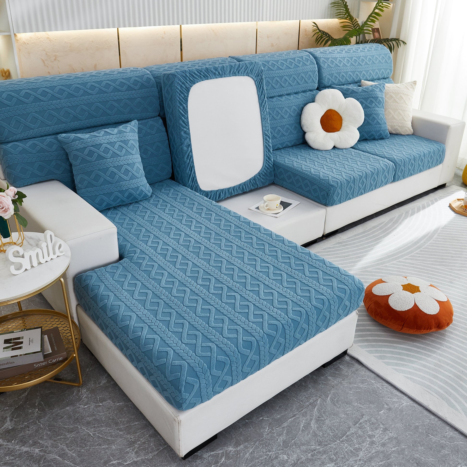Stretch Couch Seat Cushion Covers on blue sofa with decorative pillows, showcasing soft flexibility and elastic bottom for protection.