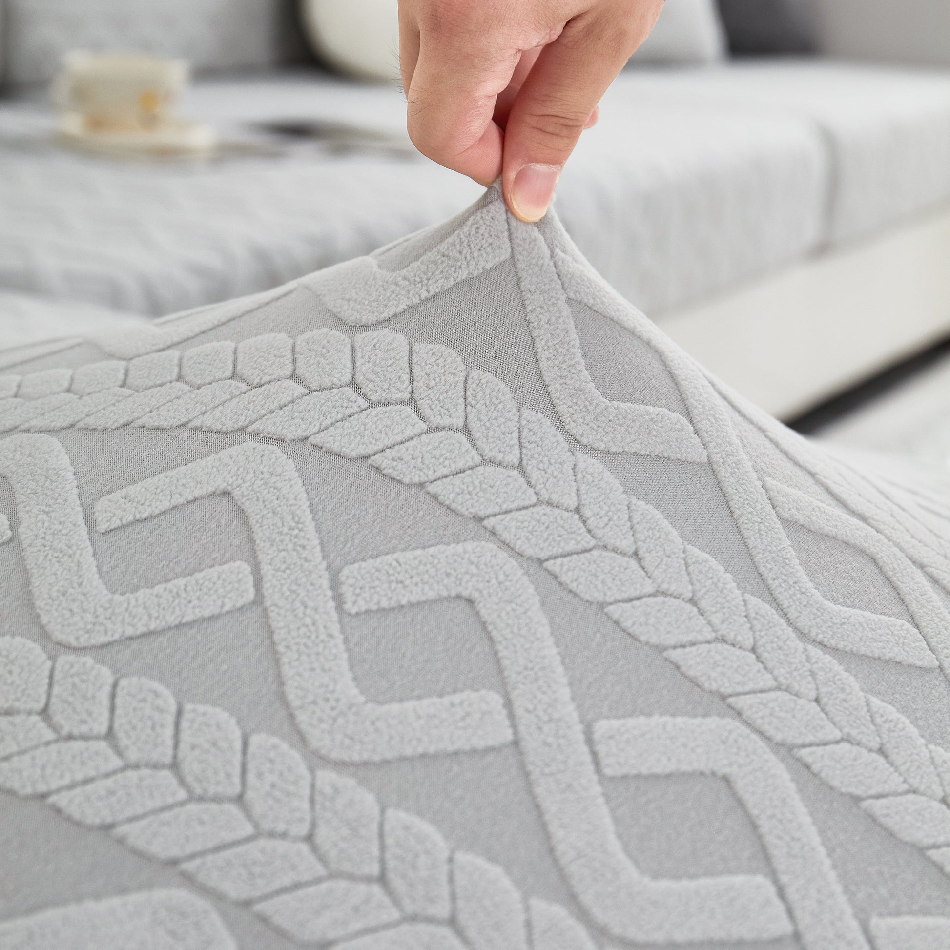 Close-up of Stretch Couch Seat Cushion Covers, Sofa Slipcover Sofa Cover Soft Flexibility with Elastic Bottom in textured pattern.