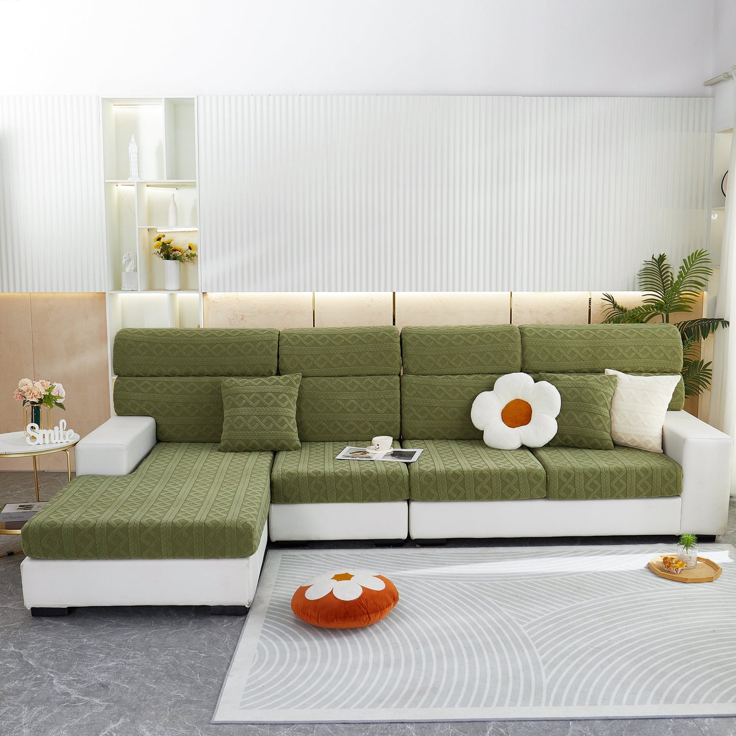 Green stretch couch seat cushion covers on modern sofa, showcasing sofa slipcover with soft flexibility and elastic bottom for protection.