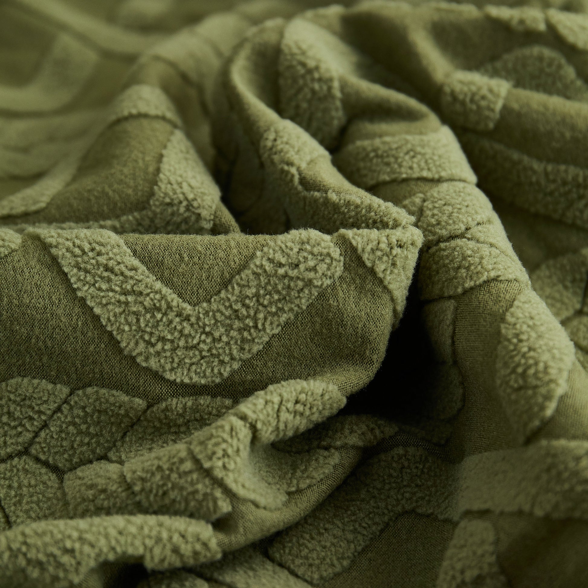 Close-up of green fabric showing texture for Stretch Couch Seat Cushion Covers, Sofa Slipcover Sofa Cover Soft Flexibility with Elastic Bottom.