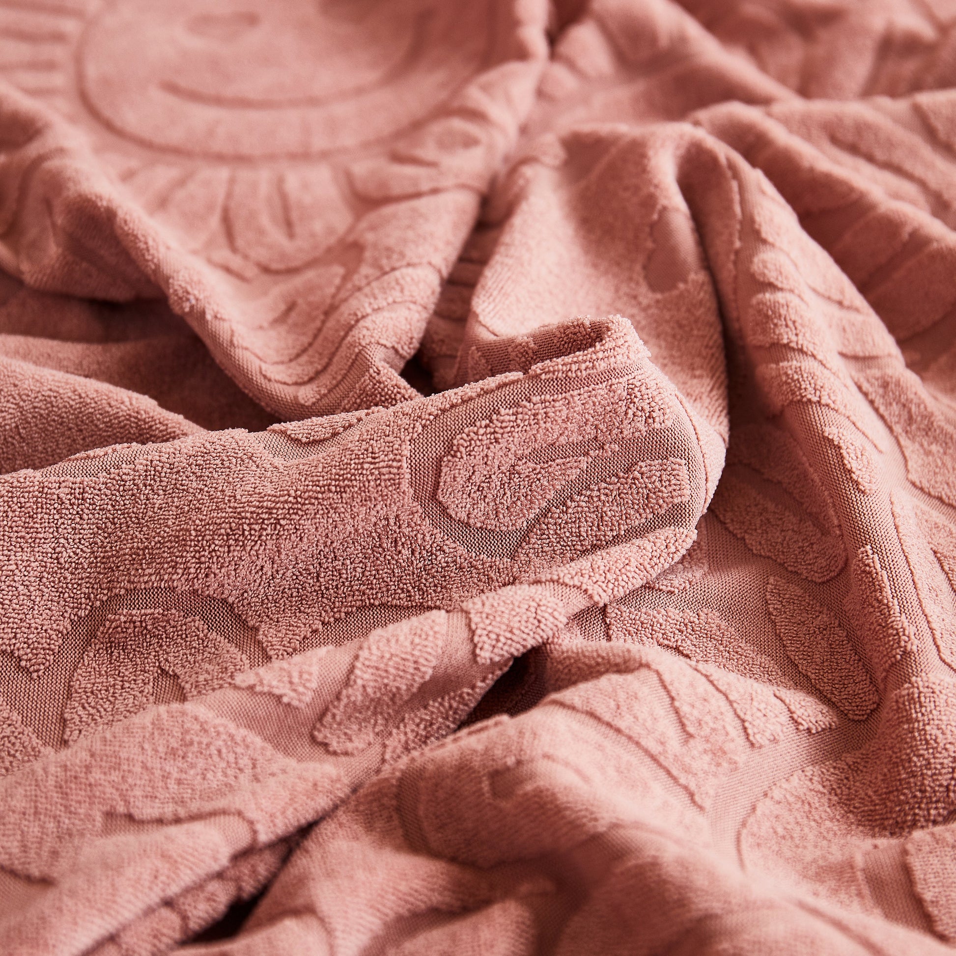 Close-up of sunflower patterned jacquard chenille fabric, highlighting texture and design