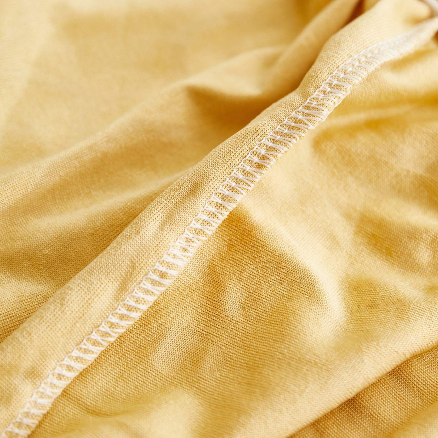 Close-up of sunflower-patterned fabric from Sofa Seat Cover, Sunflower Patterned Elastic Skirted Couch Cushion Covers for 1/2/3/4-Seater Sofas.