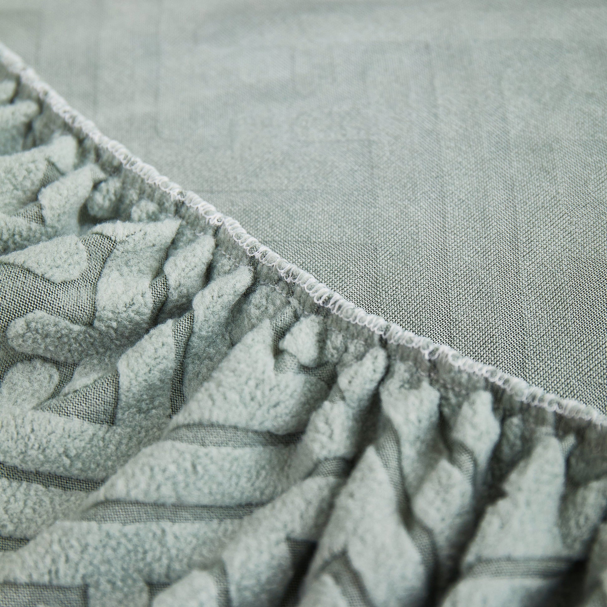 Close-up of high-quality fabric on Stretch Sofa Covers with Skirt for Couch Seat and Cushion, Chaise, Sectional, 1/2/3/4 Seater Sofas