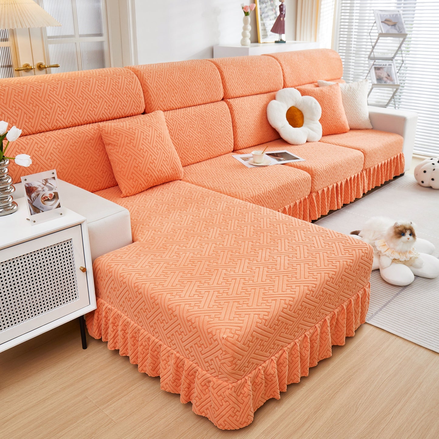 Stretch Sofa Covers with Skirt for Couch Seat and Cushion, Chaise, Sectional, 1/2/3/4 Seater Sofas in orange on a living room couch