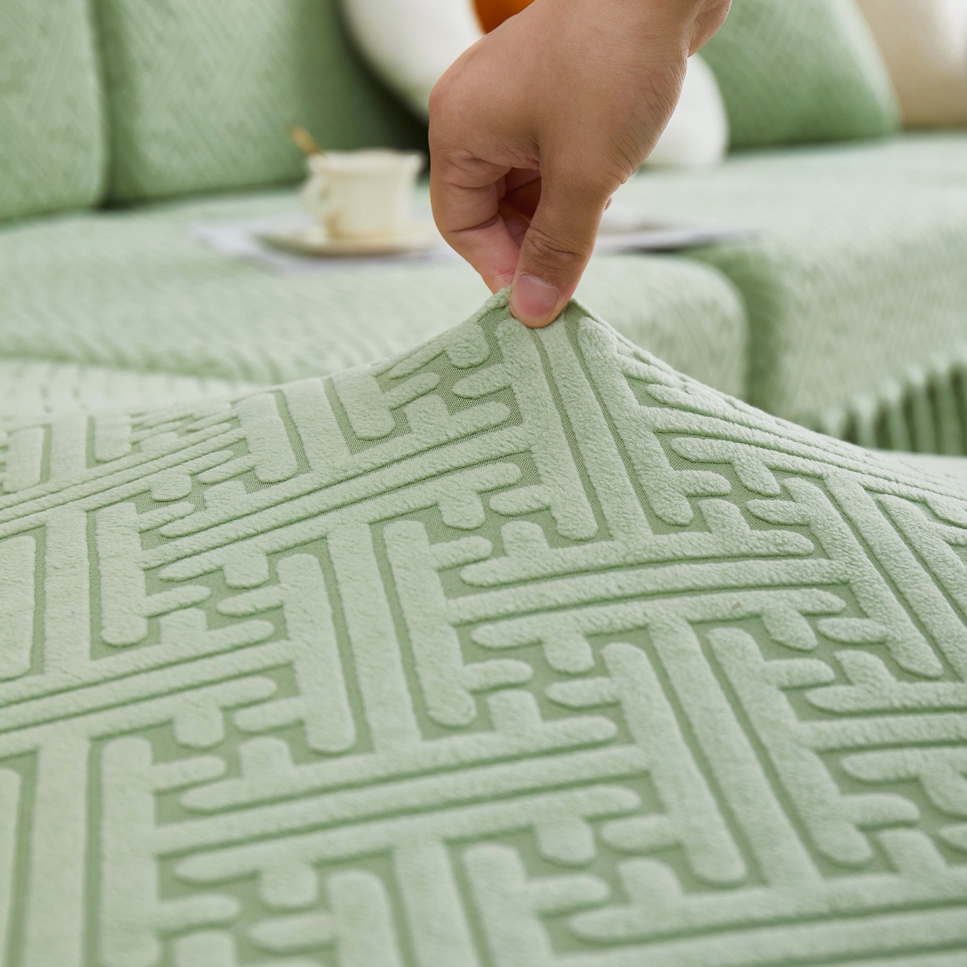 Close-up of high-quality stretch sofa cover with a detailed pattern, designed for 1/2/3/4 seater sofas, chaise, and sectional sofas.