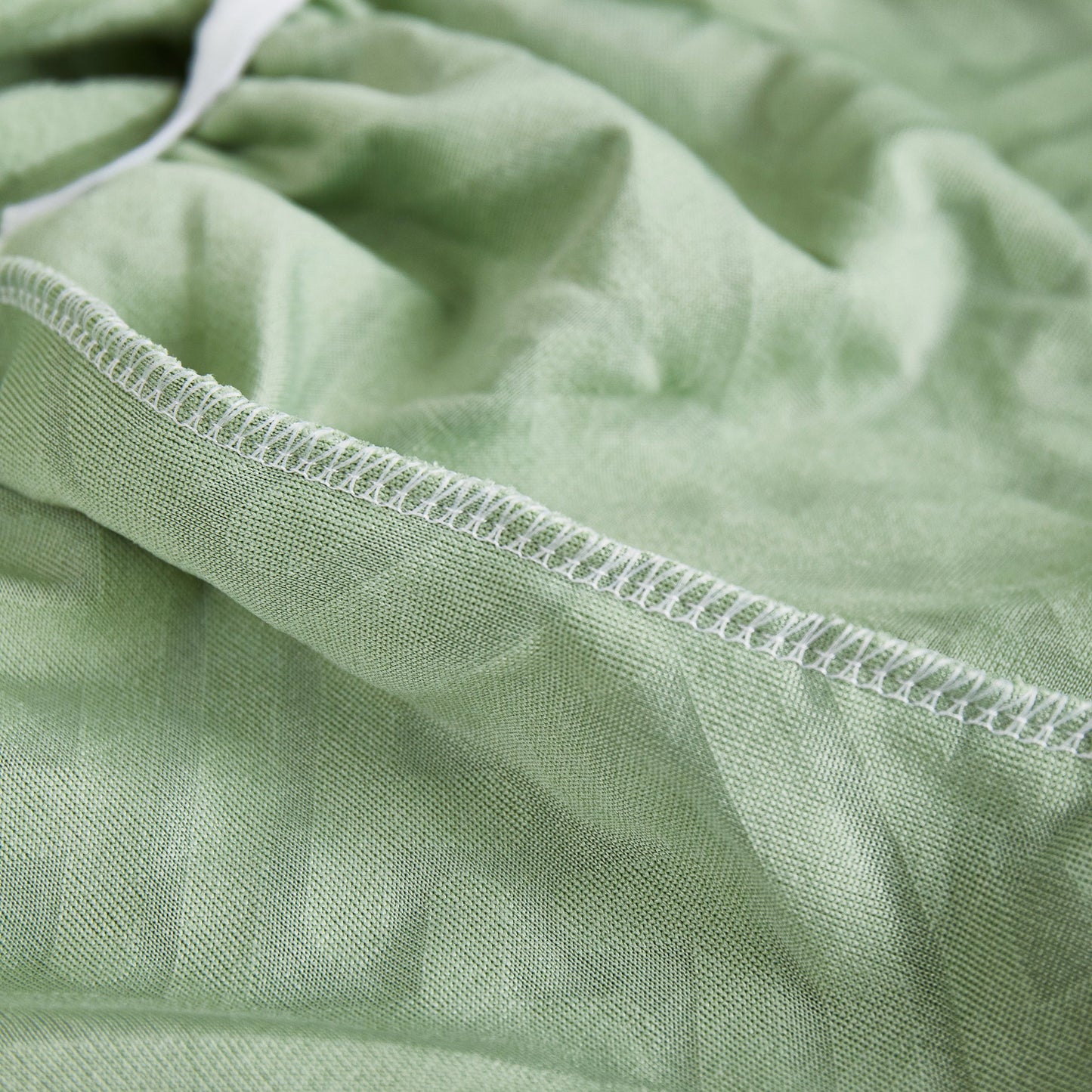 Close-up of Stretch Sofa Covers with Skirt for Couch Seat and Cushion, Chaise, Sectional, 1/2/3/4 Seater Sofas fabric texture