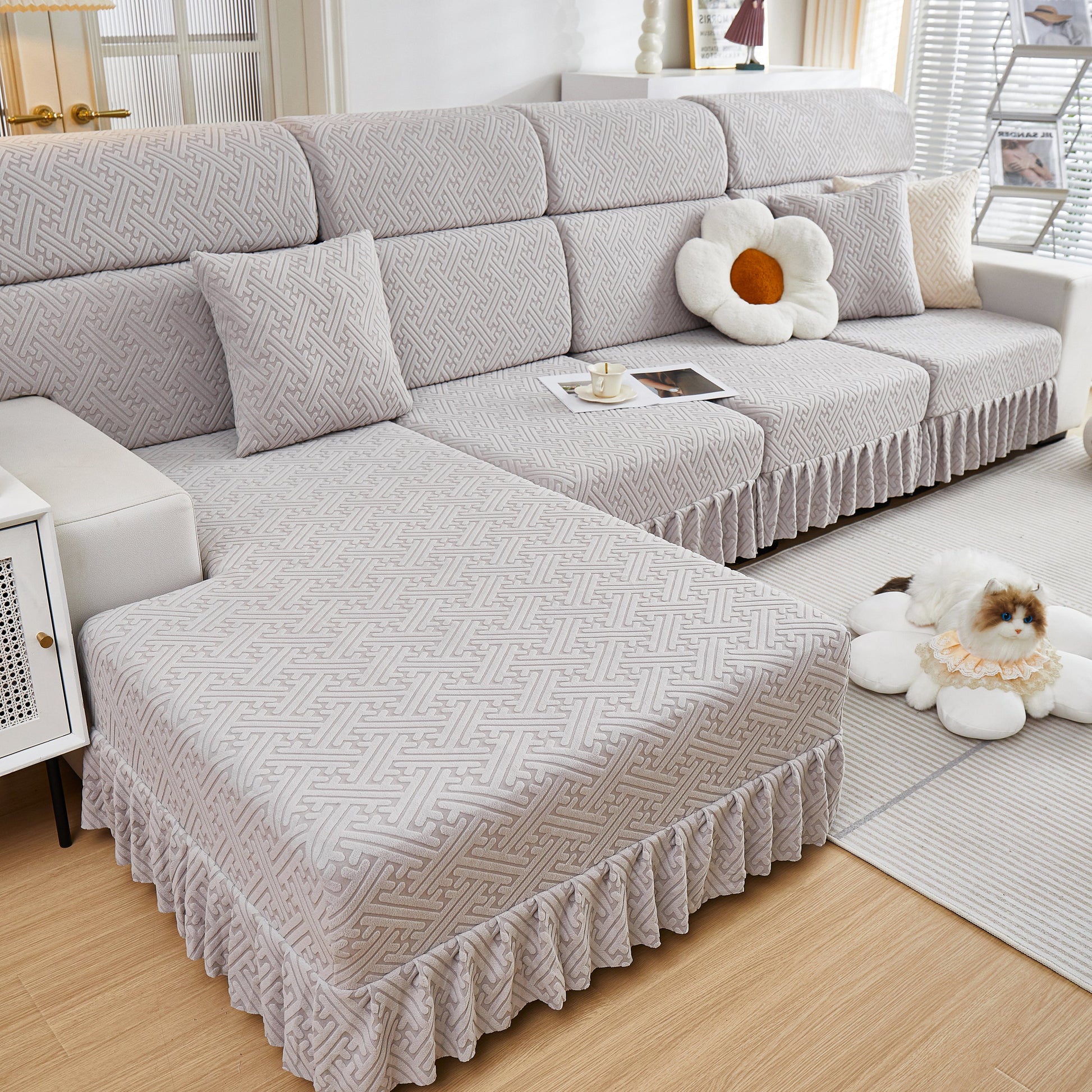Stretch Sofa Covers with Skirt for Couch Seat and Cushion, Chaise, Sectional, 1/2/3/4 Seater Sofas shown on a stylish modern couch.