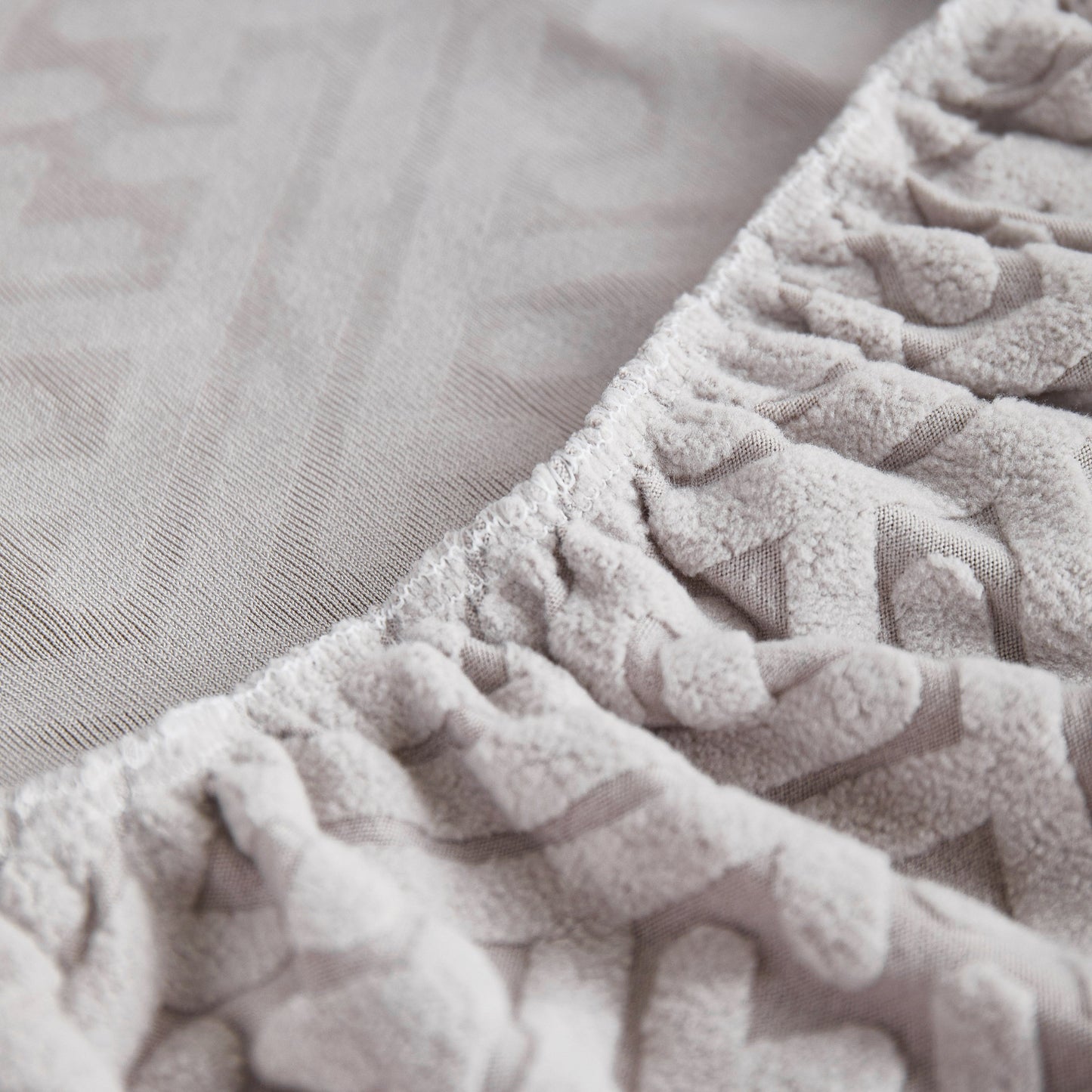 Close-up view of high-quality fabric of Stretch Sofa Covers with Skirt for Couch Seat and Cushion, Chaise, Sectional, 1/2/3/4 Seater Sofas.