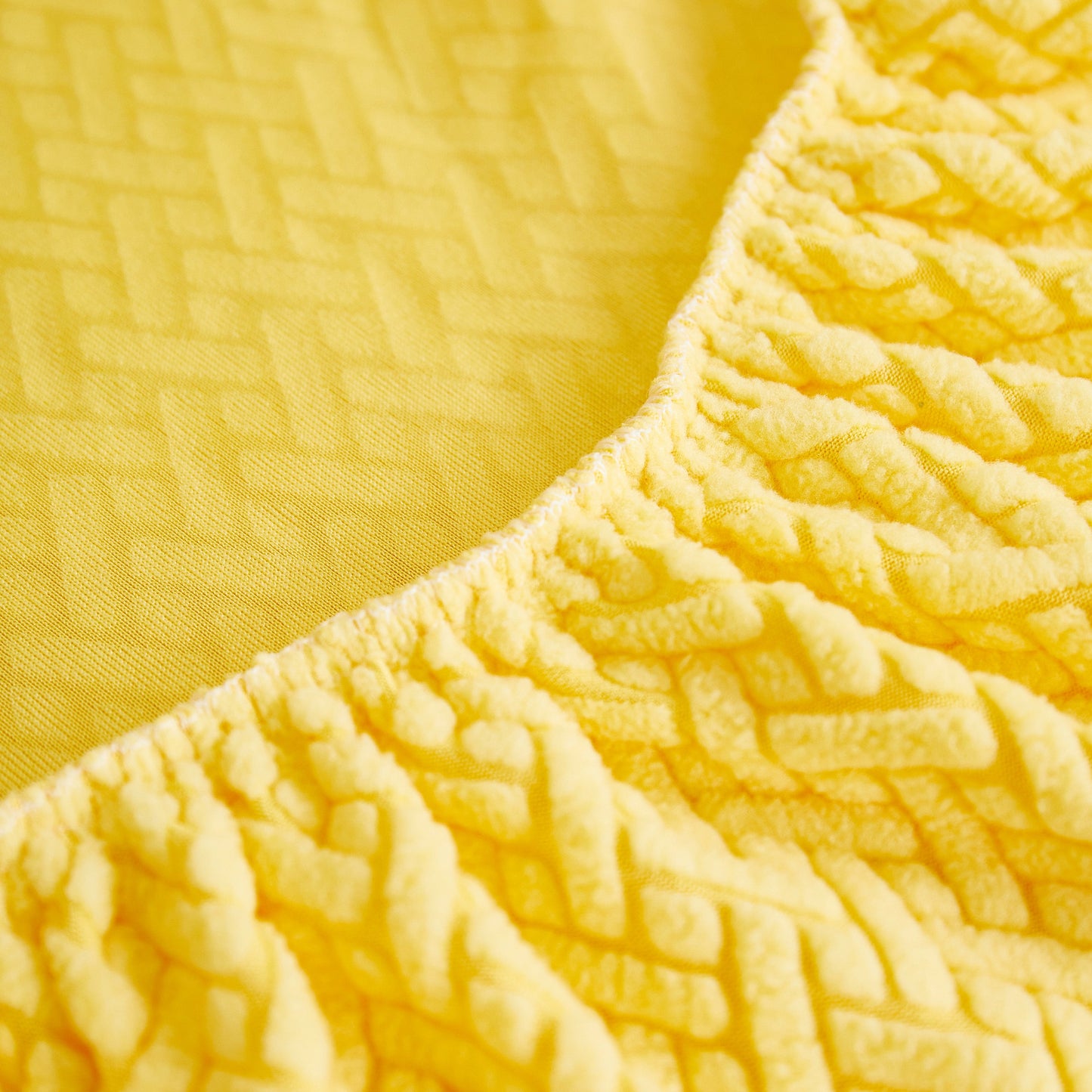 Detailed view of Slipcover KAS Tailored Sofa Cushion Covers Stretch Couch Seat Covers with Skirt for Sectional Sofas in yellow fabric.