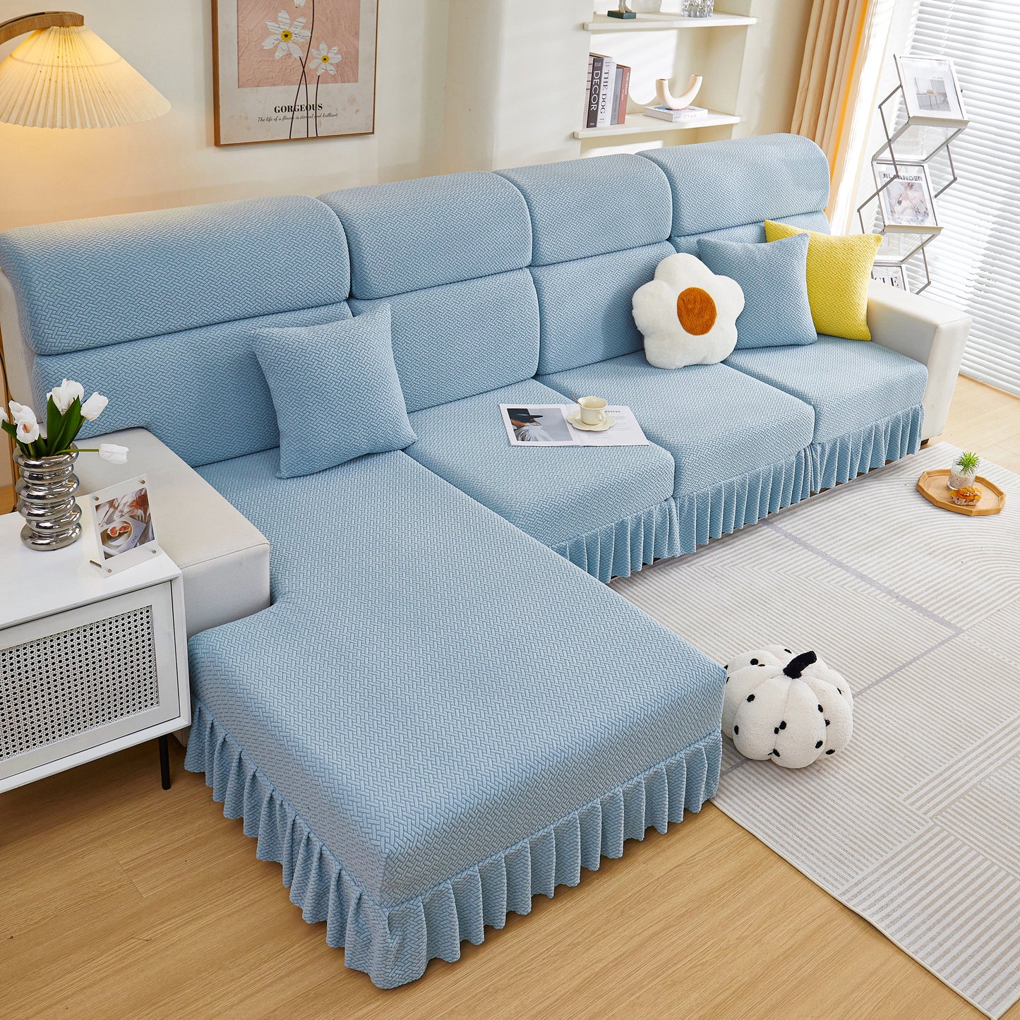 Tailored Sofa Cushion Covers Stretch Couch Seat Covers with Skirt for Sectional Sofas in light blue displayed in modern living room