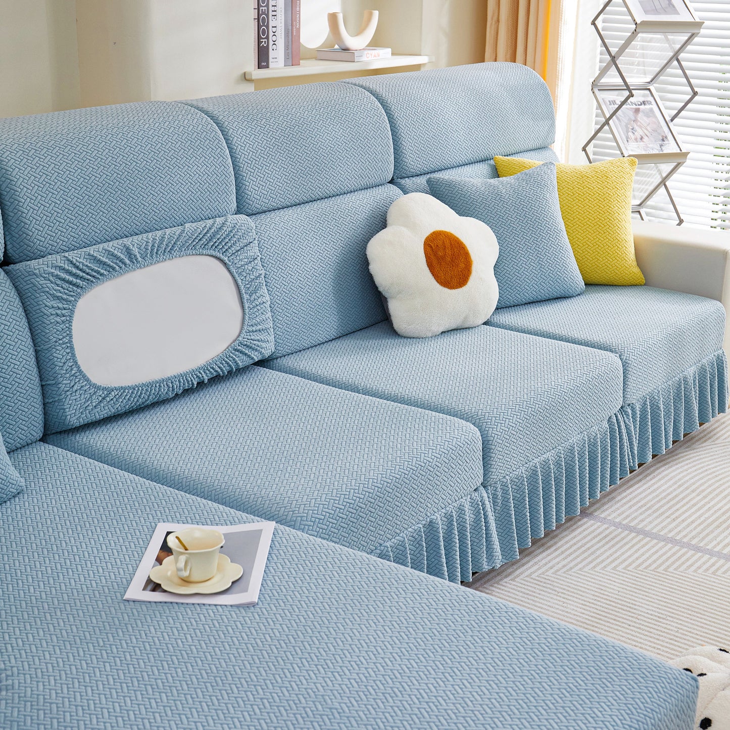 Tailored Sofa Cushion Covers Stretch Couch Seat Covers with Skirt for Sectional Sofas in blue fabric on a modern couch