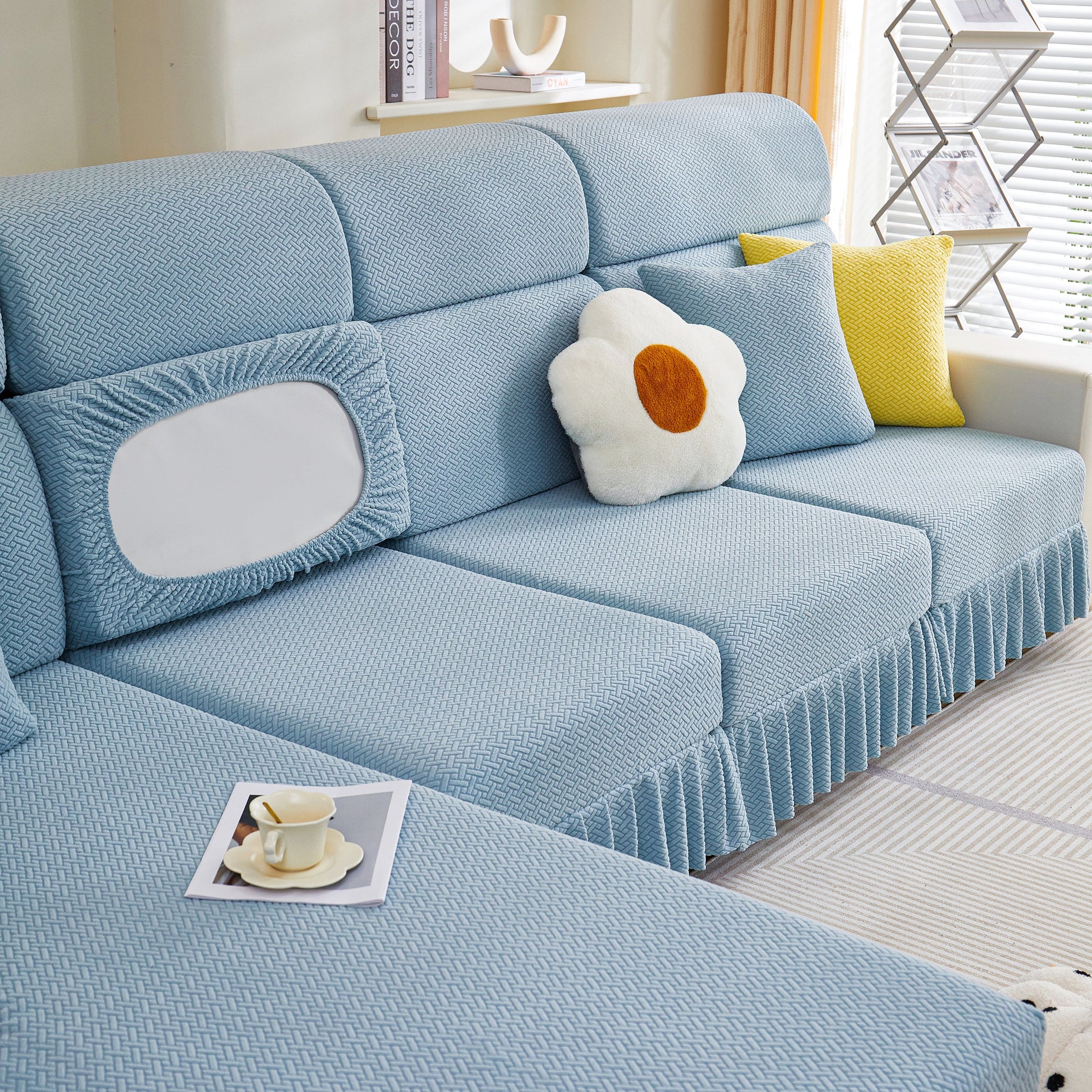 Tailored Sofa Cushion Covers Stretch Couch Seat Covers with Skirt for Sectional Sofas in blue fabric on a modern couch