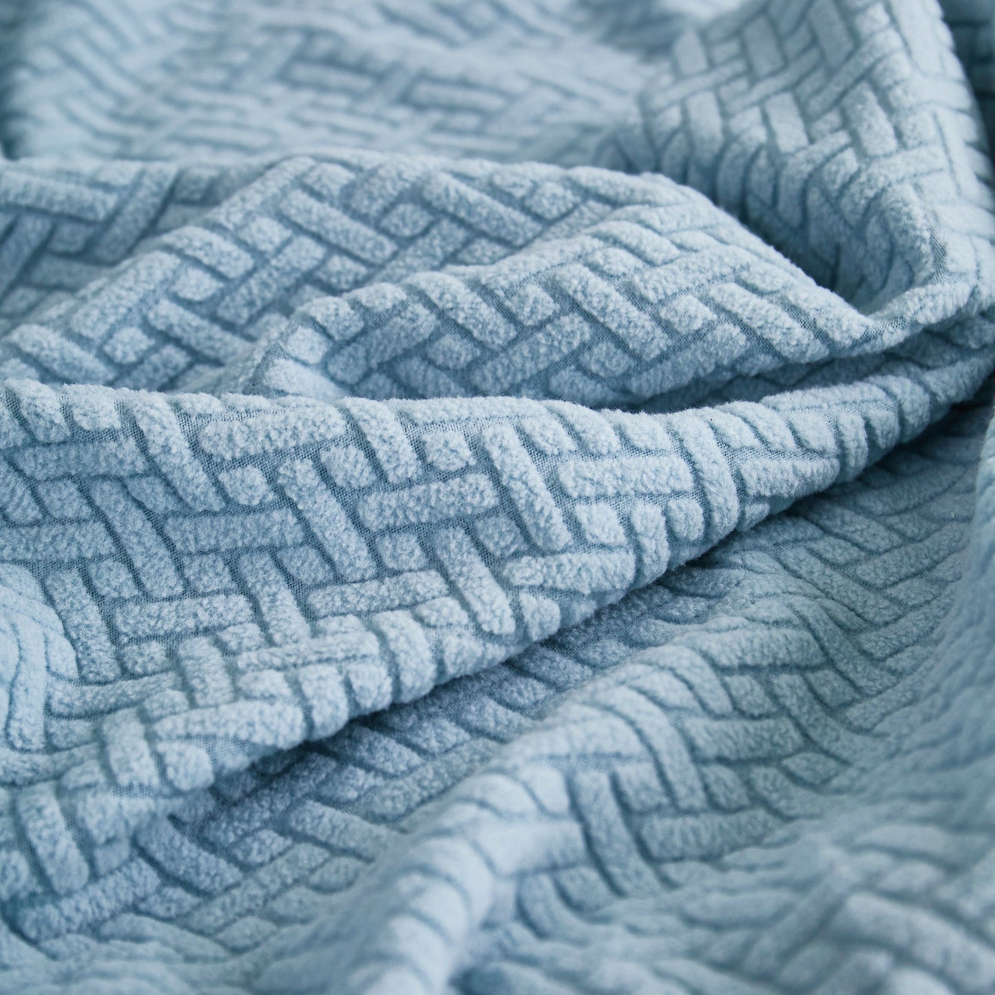 Close-up of high-quality polar fleece fabric for Tailored Sofa Cushion Covers Stretch Couch Seat Covers with Skirt for Sectional Sofas.