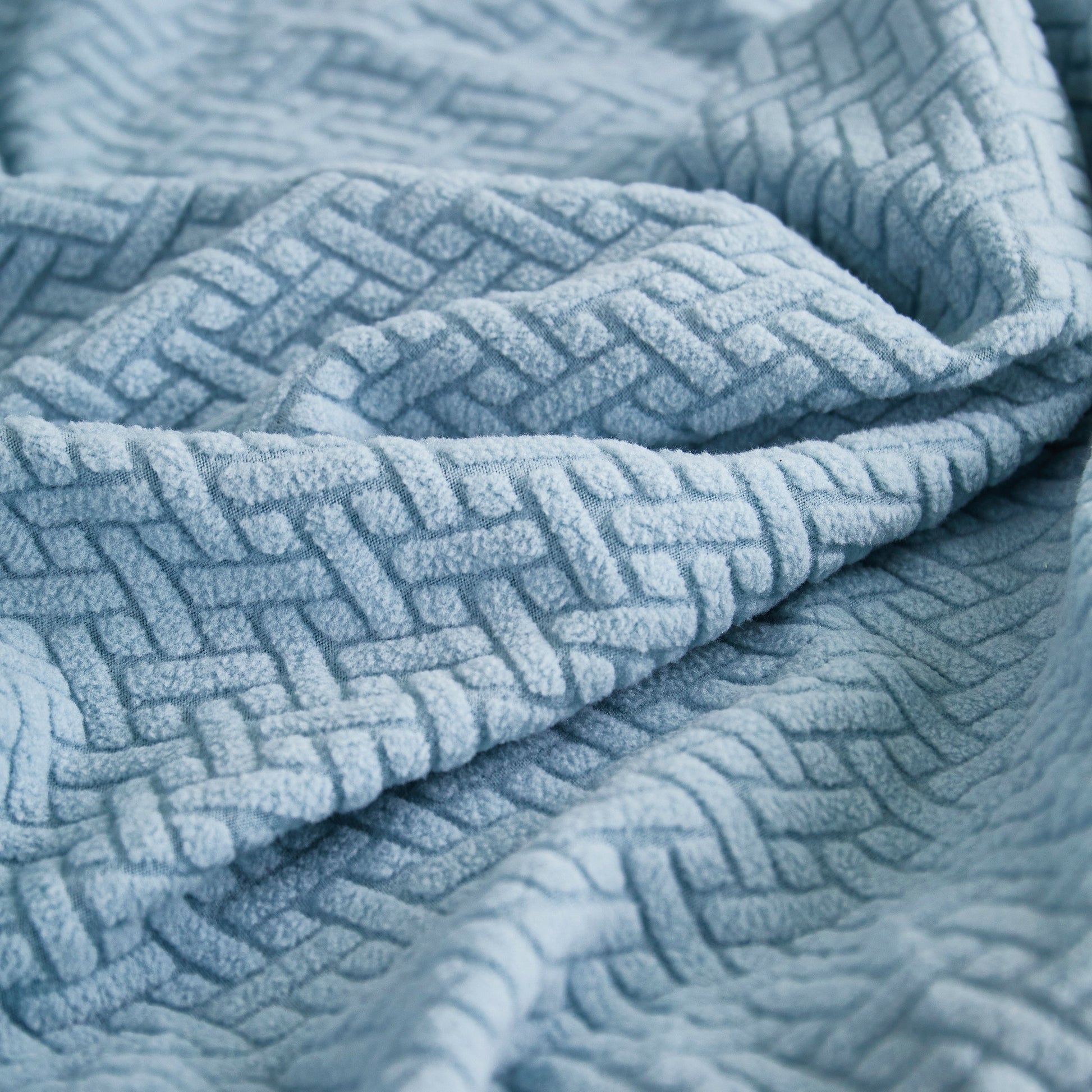 Close-up of high-quality polar fleece fabric for Tailored Sofa Cushion Covers Stretch Couch Seat Covers with Skirt for Sectional Sofas.