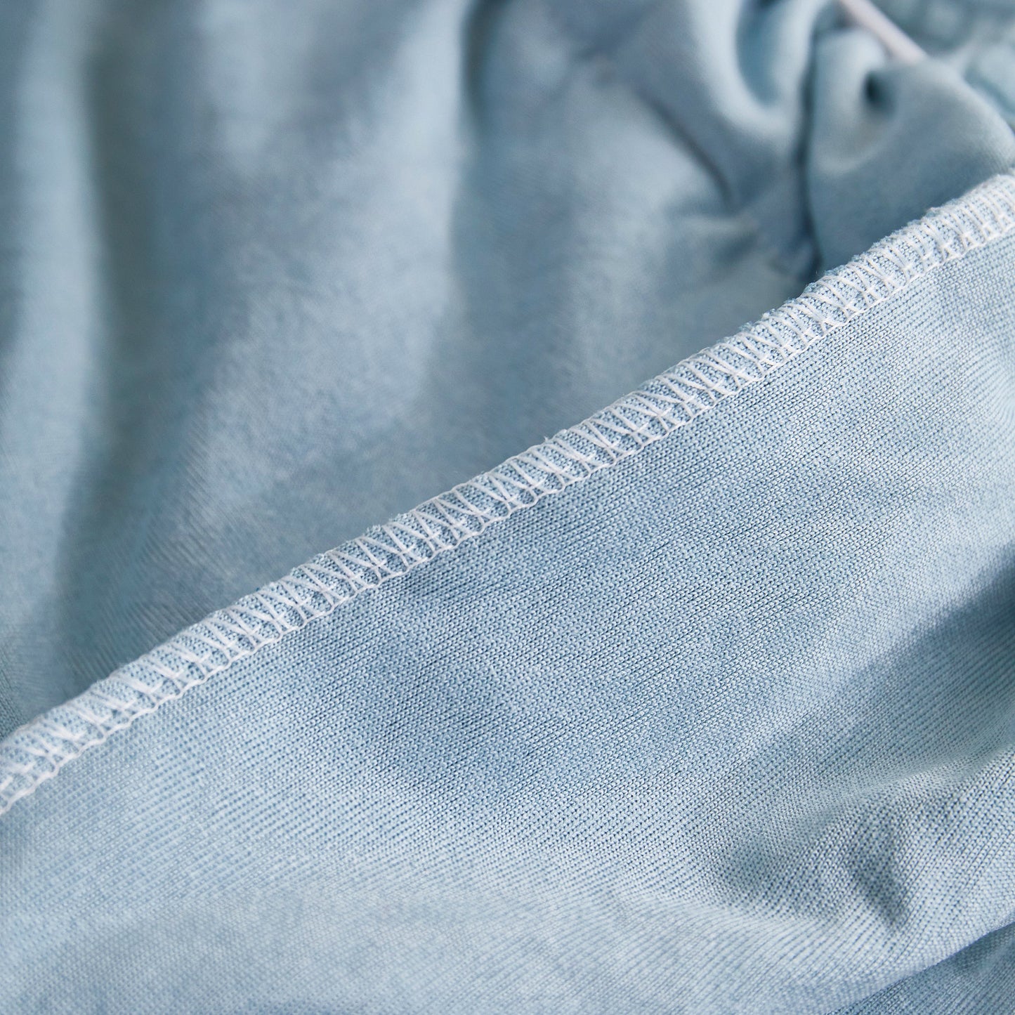 Close-up of Tailored Sofa Cushion Covers Stretch Couch Seat Covers with Skirt for Sectional Sofas in premium polar fleece fabric