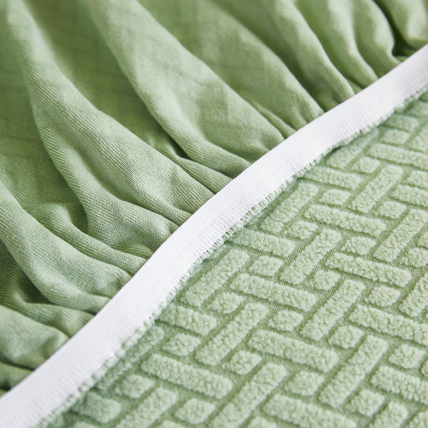 Close-up of Tailored Sofa Cushion Covers Stretch Couch Seat Covers with Skirt for Sectional Sofas in green fabric