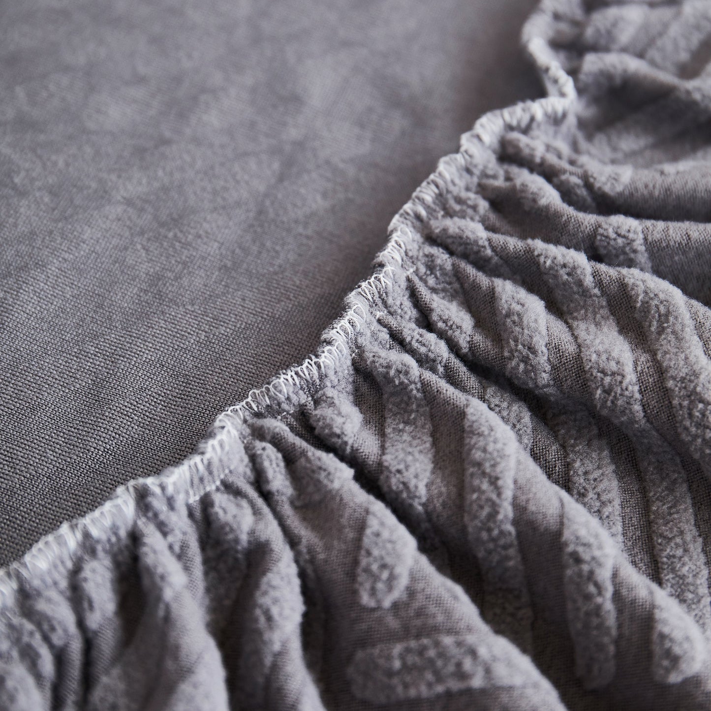 Close-up of Stretch Sofa Covers for Couch Seats and Cushions, Suitable for 1/2/3/4/L Seater Sofas and Couches in gray fabric