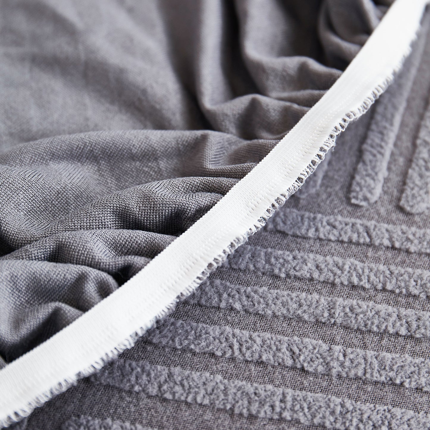 Close-up of Stretch Sofa Covers for Couch Seats and Cushions, Suitable for 1/2/3/4/L Seater Sofas and Couches with fabric detail