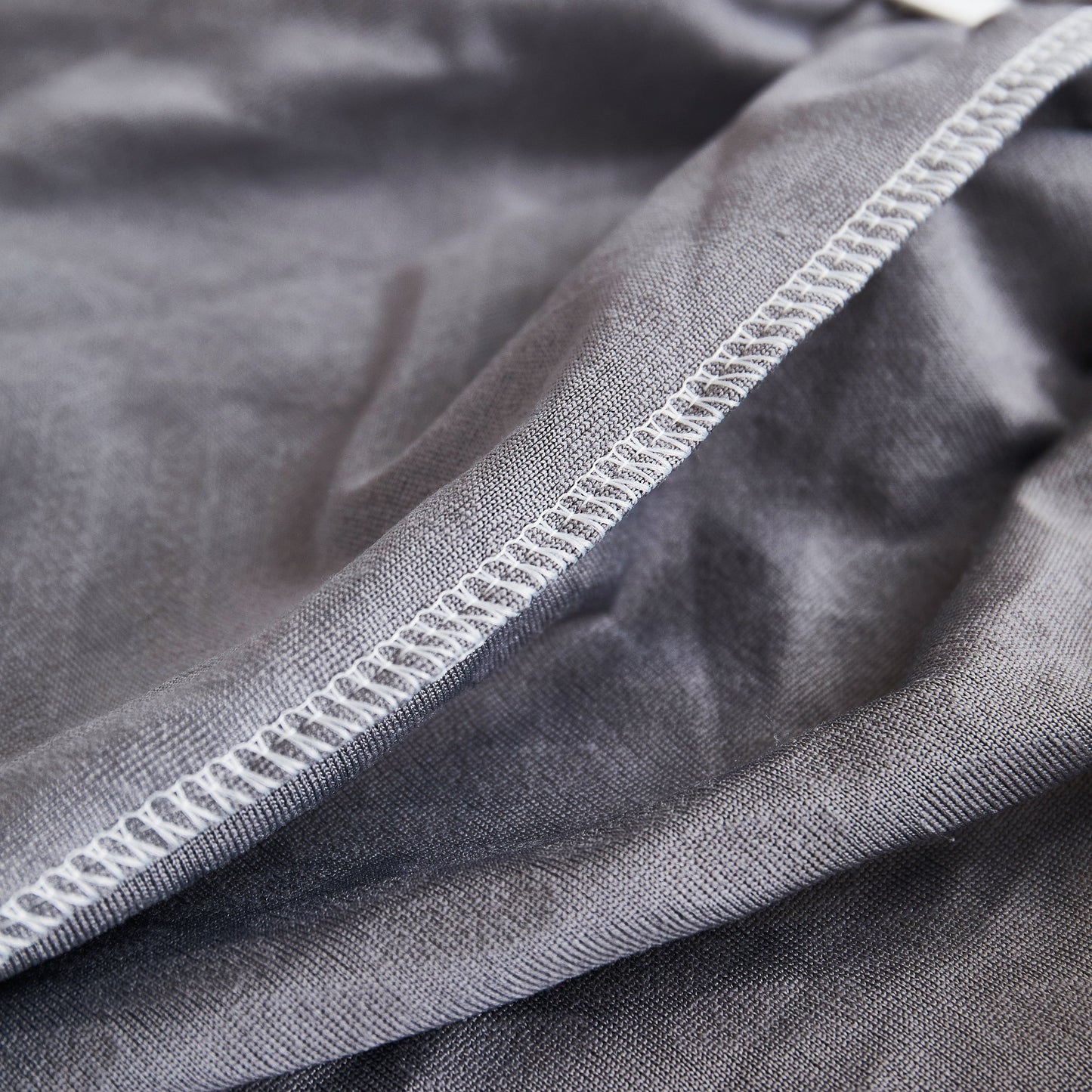 Close-up of high-quality fabric of Stretch Sofa Covers for Couch Seats and Cushions, Suitable for 1/2/3/4/L Seater Sofas and Couches