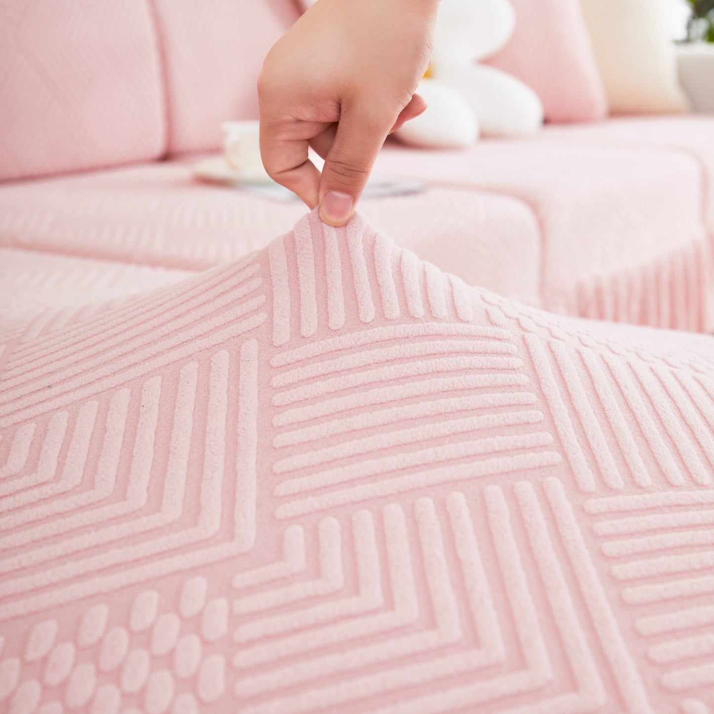 Close-up of Stretch Sofa Covers for Couch Seats and Cushions, Suitable for 1/2/3/4/L Seater Sofas and Couches with textured pattern.