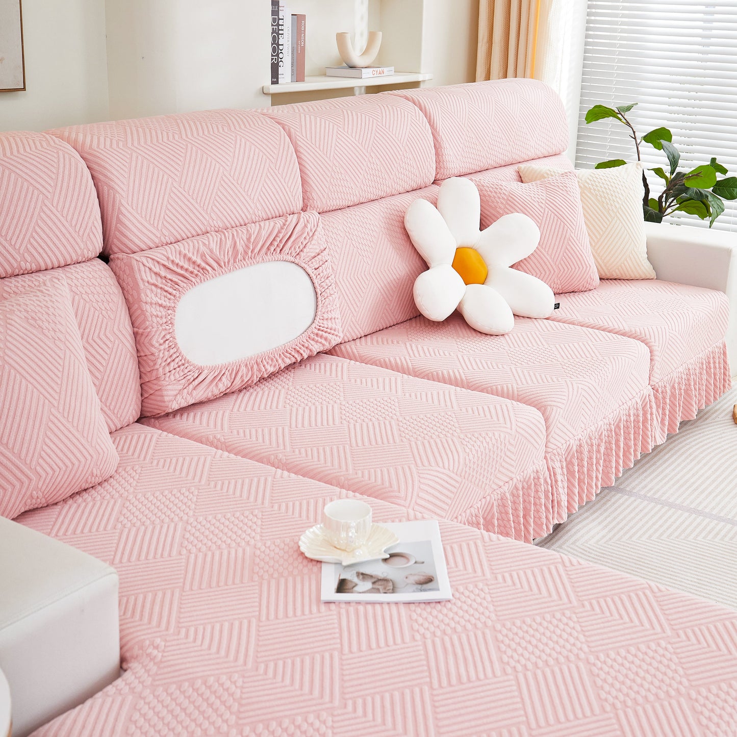 Stretch Sofa Covers for Couch Seats and Cushions, Suitable for 1/2/3/4/L Seater Sofas and Couches in pink with decorative pillow.