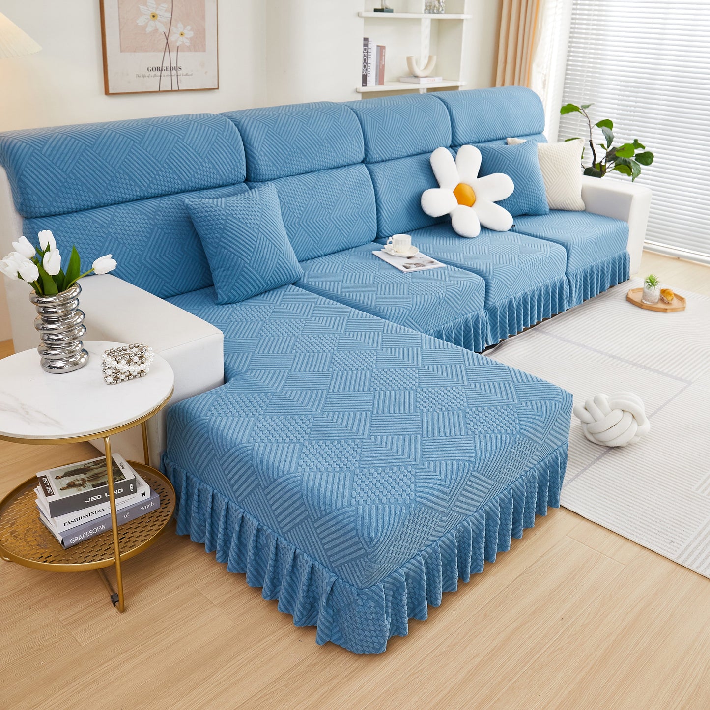 Stretch Sofa Covers for Couch Seats and Cushions on a stylish blue 3-seater sofa with decorative pillows and a chic living room setting.