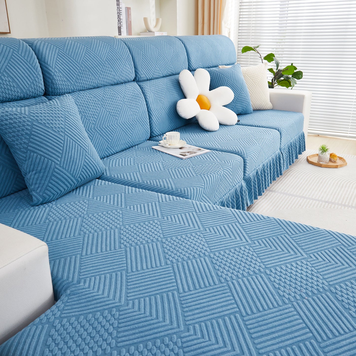 Stylish blue stretch sofa covers for 1/2/3/4/L seater sofas and couches with decorative cushioning, elegant living room setting