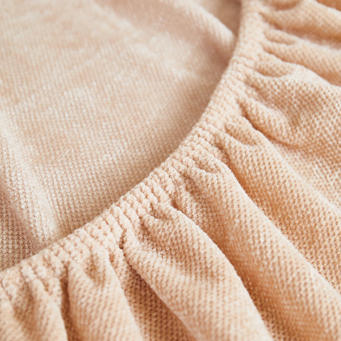 Close-up of Super Stretch Seat Cushion/Couch Slipcover in luxurious Chenille fabric, showcasing its texture and elastic edging.