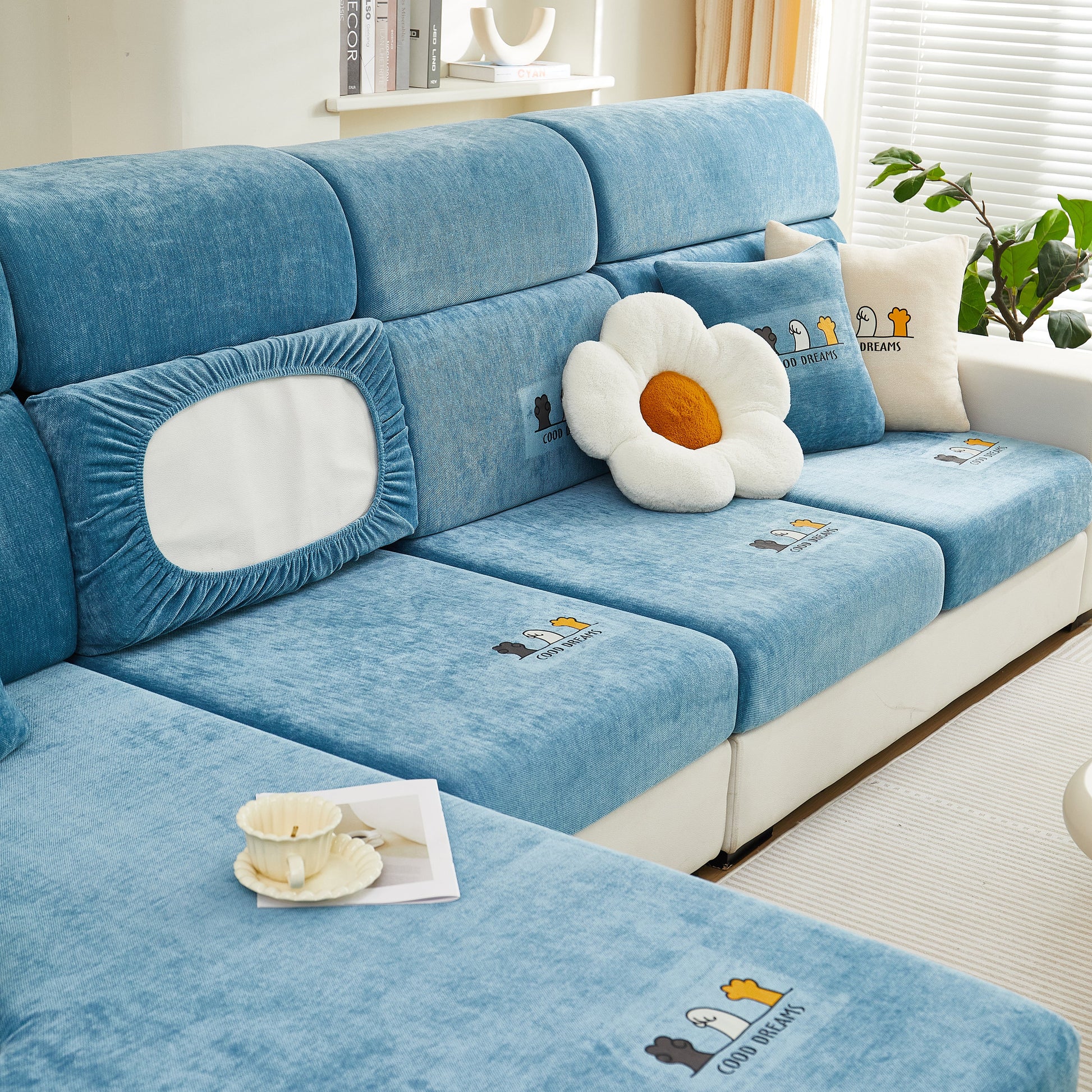 Living room with Super Stretch Seat Cushion/Couch Slipcover, Solid Couch Cushion Covers Washable Furniture Protector in blue.
