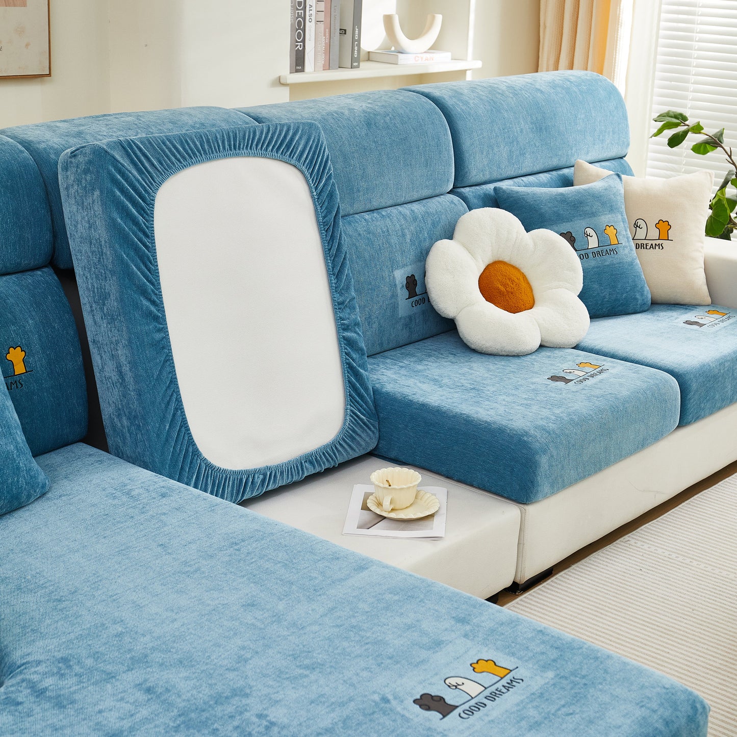 Super Stretch Seat Cushion/Couch Slipcover on blue sofa, Solid Couch Cushion Covers Washable Furniture Protector, with white flower pillow