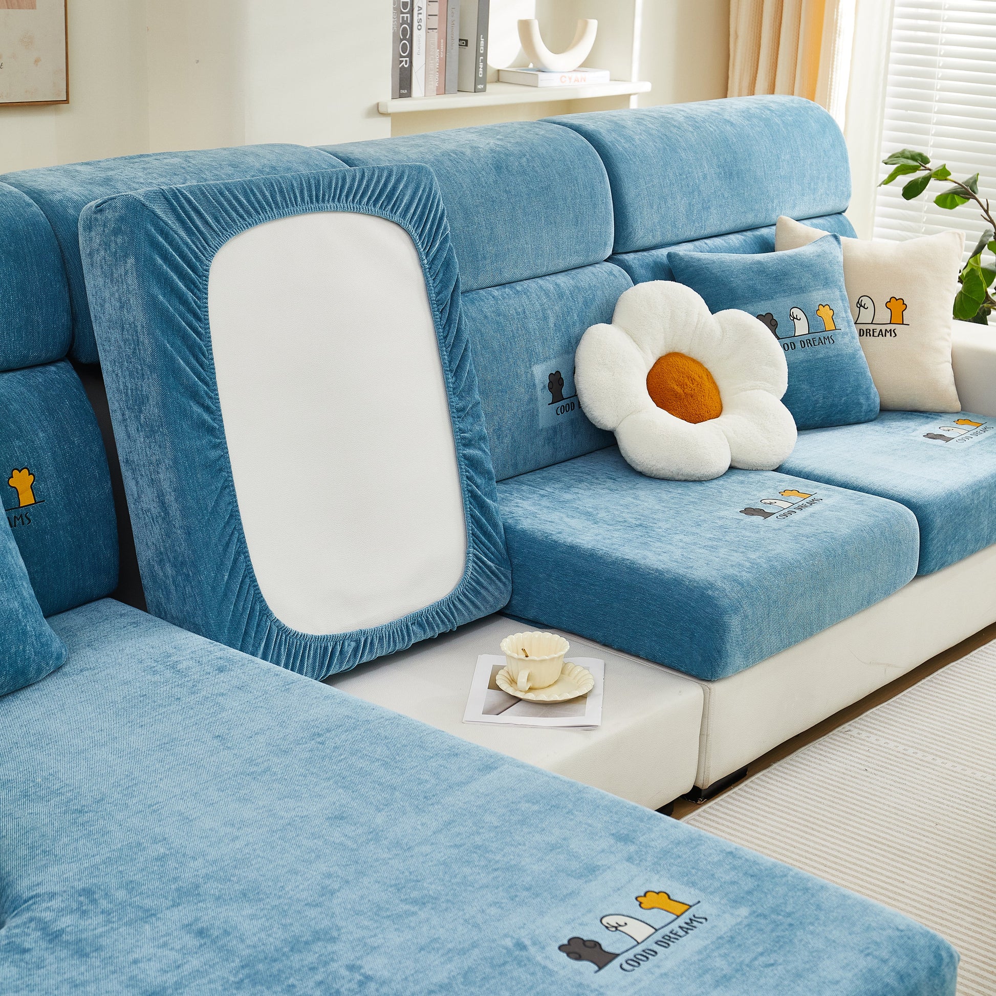Super Stretch Seat Cushion/Couch Slipcover on blue sofa, Solid Couch Cushion Covers Washable Furniture Protector, with white flower pillow