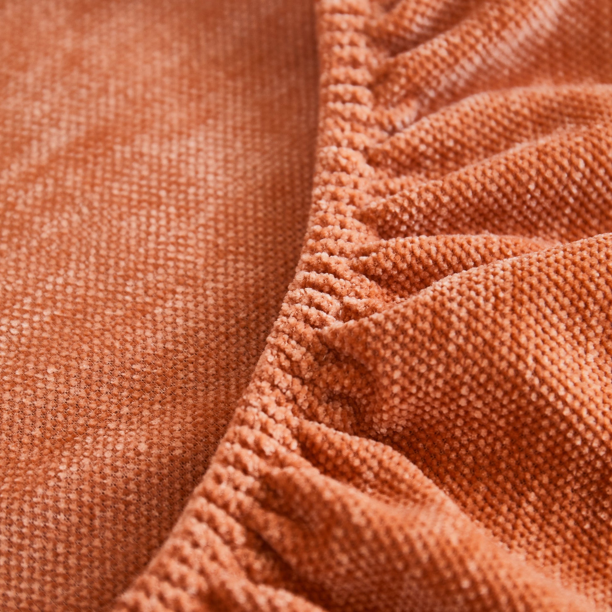Close-up of a Super Stretch Seat Cushion/Couch Slipcover, Solid Couch Cushion Covers Washable Furniture Protector in luxurious Chenille fabric.