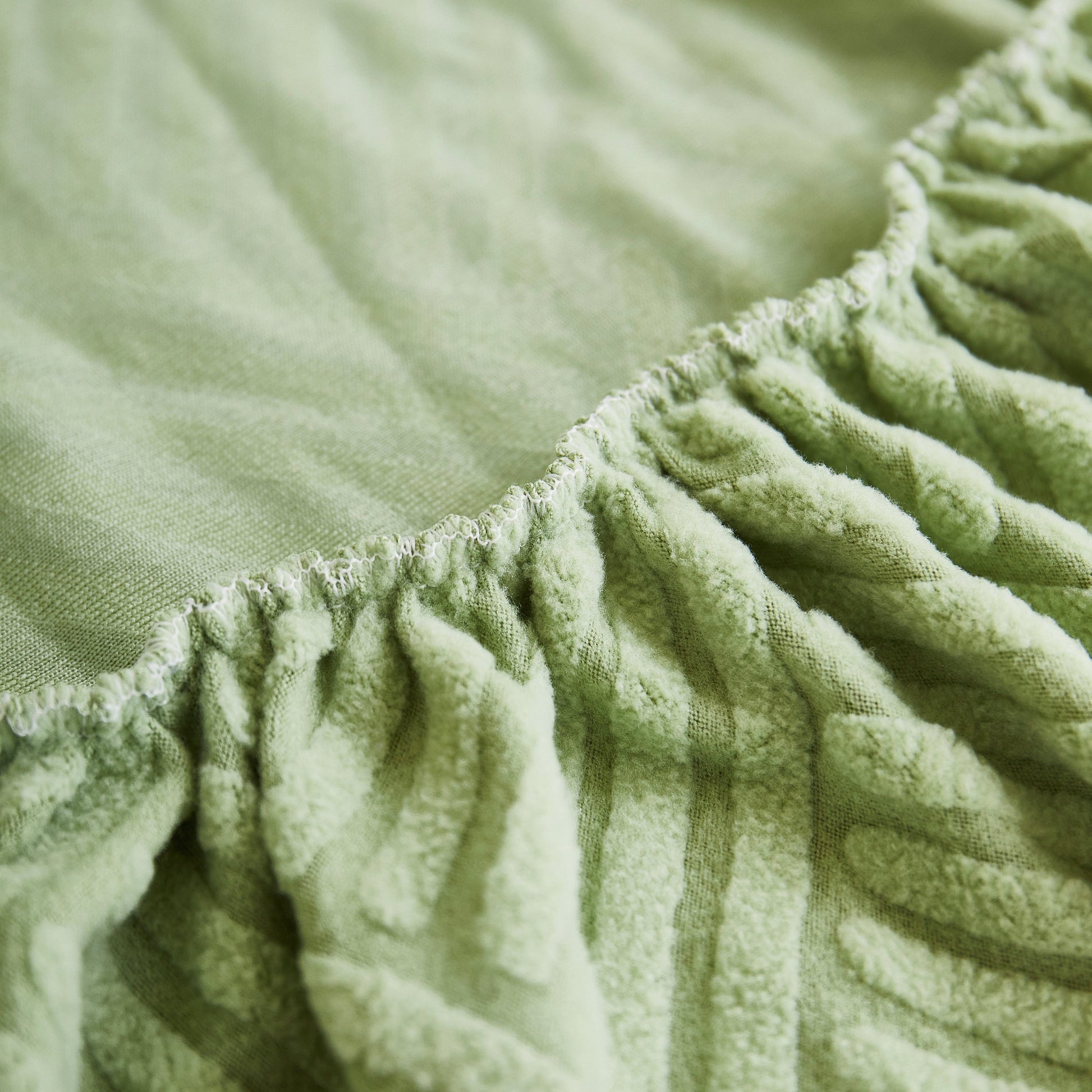Green fabric detail from Stretch Sofa Covers for Couch Seats and Cushions, Suitable for 1/2/3/4/L Seater Sofas and Couches