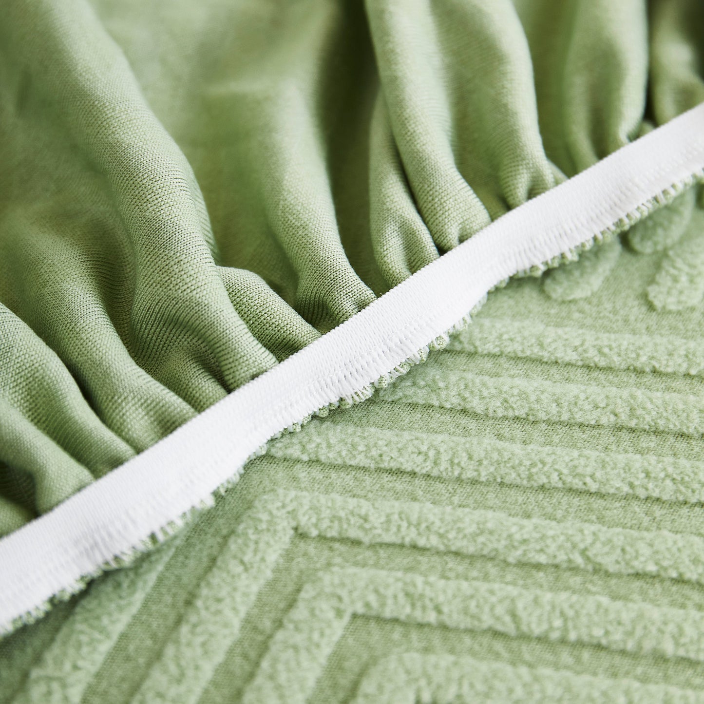 Close-up of olive green fabric from Stretch Sofa Covers for Couch Seats and Cushions, Suitable for 1/2/3/4/L Seater Sofas and Couches
