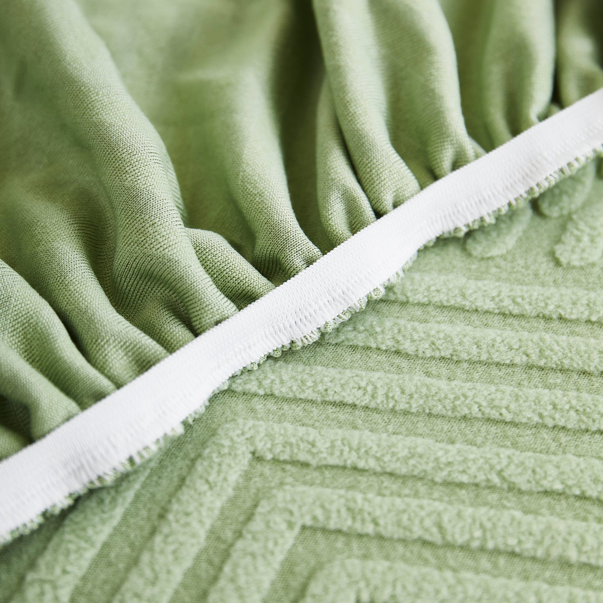 Close-up of olive green fabric from Stretch Sofa Covers for Couch Seats and Cushions, Suitable for 1/2/3/4/L Seater Sofas and Couches