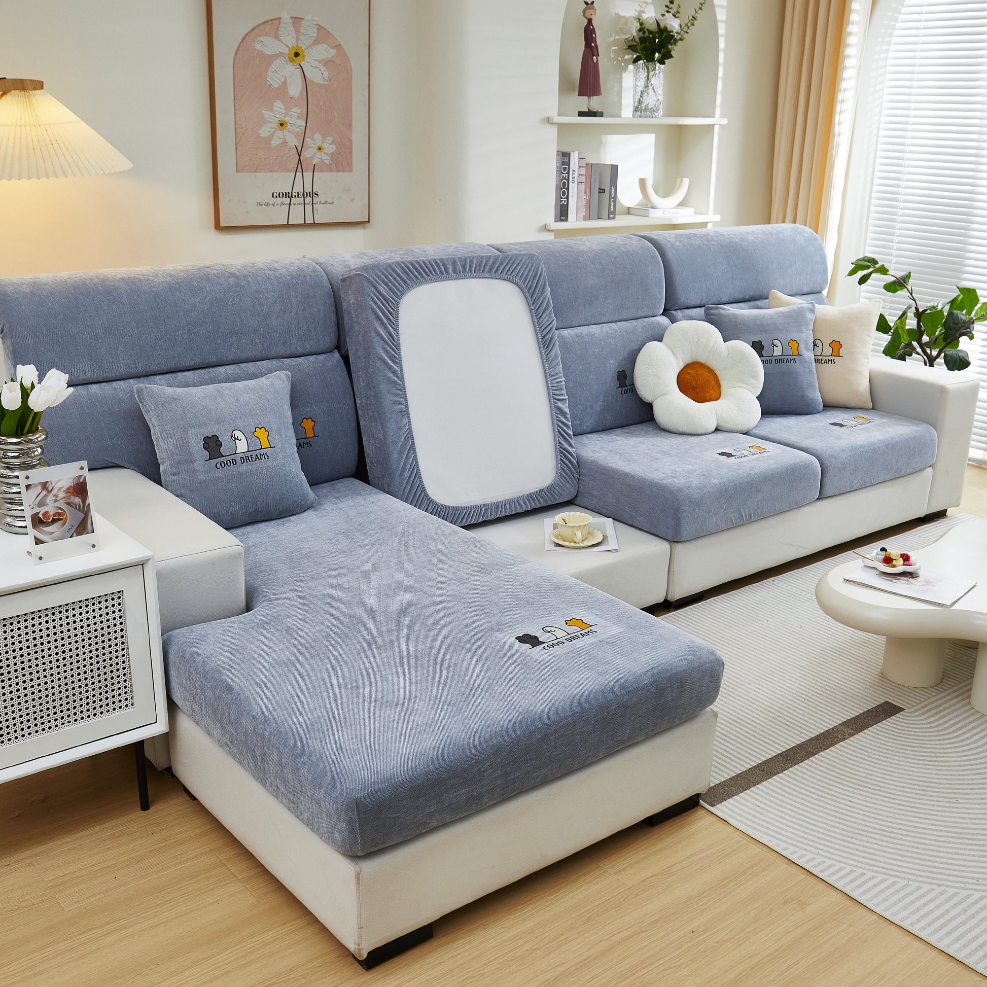 Living room with blue Super Stretch Seat Cushion/Couch Slipcover, Solid Couch Cushion Covers Washable Furniture Protector on sectional sofa.