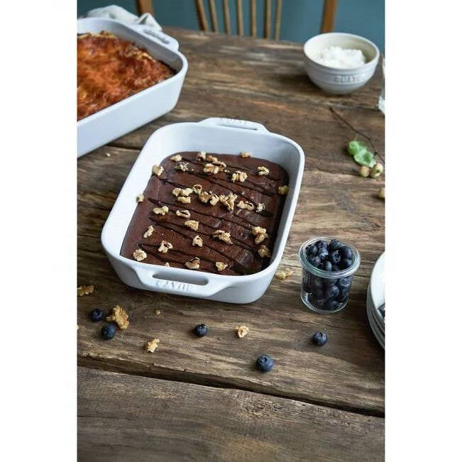 2 Piece Ceramic Stoneware Bakeware Casserole Dish Set in White on a table with blueberry dessert