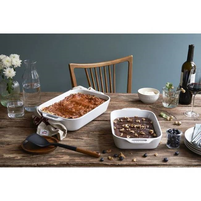 2 Piece Ceramic Stoneware Bakeware Casserole Dish Set in White on a dining table with food