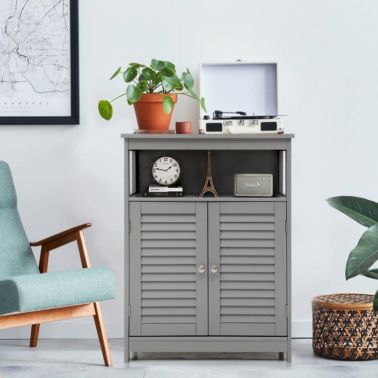 Grey Farmhouse Bathroom Linen Cabinet with Louvered Doors and Open Shelf in a modern living space.